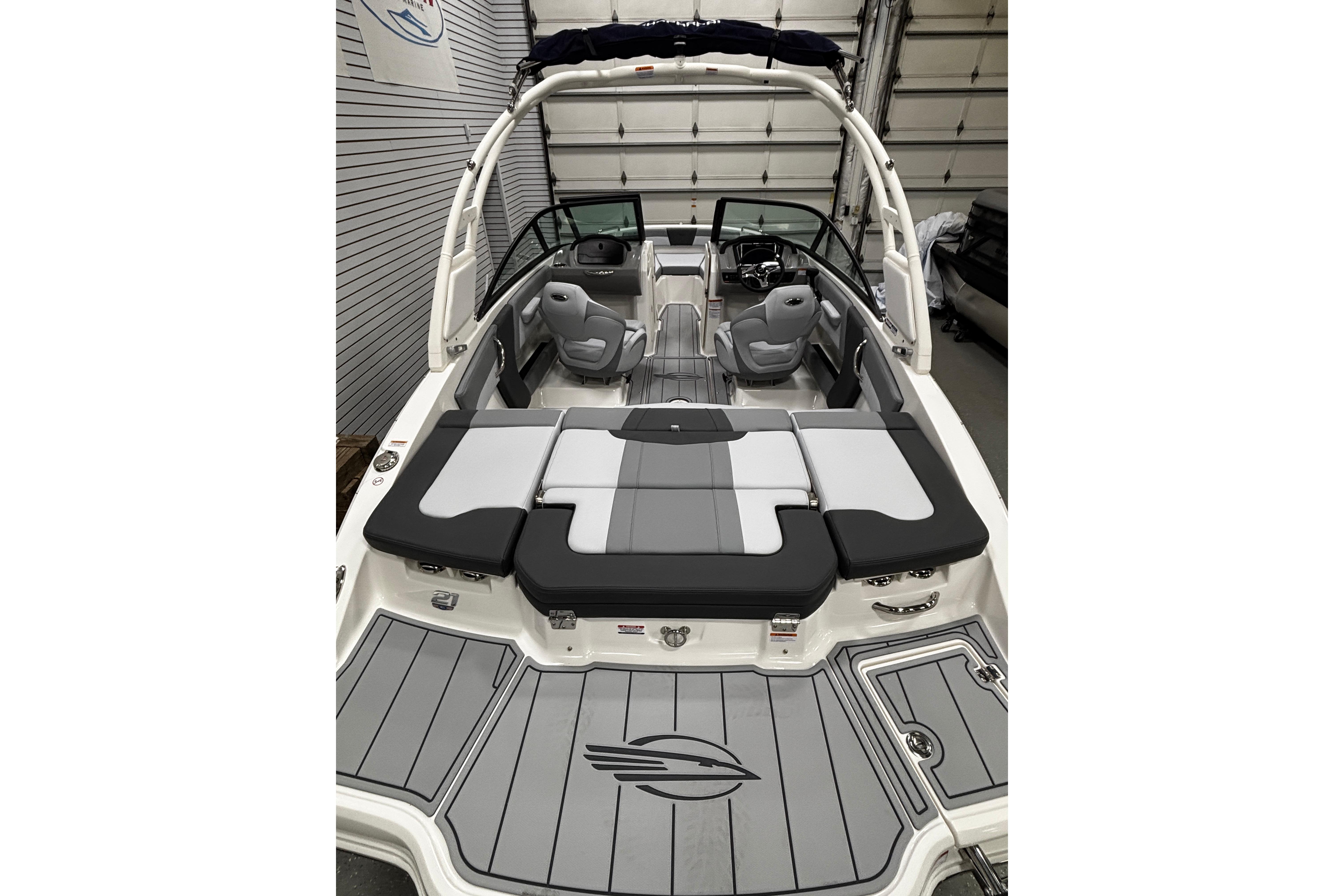 2026 Chaparral 21 SSi boat interior with gray seating and sleek design.