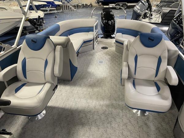 2025 South Bay LE pontoon boat interior with plush seating and modern design.