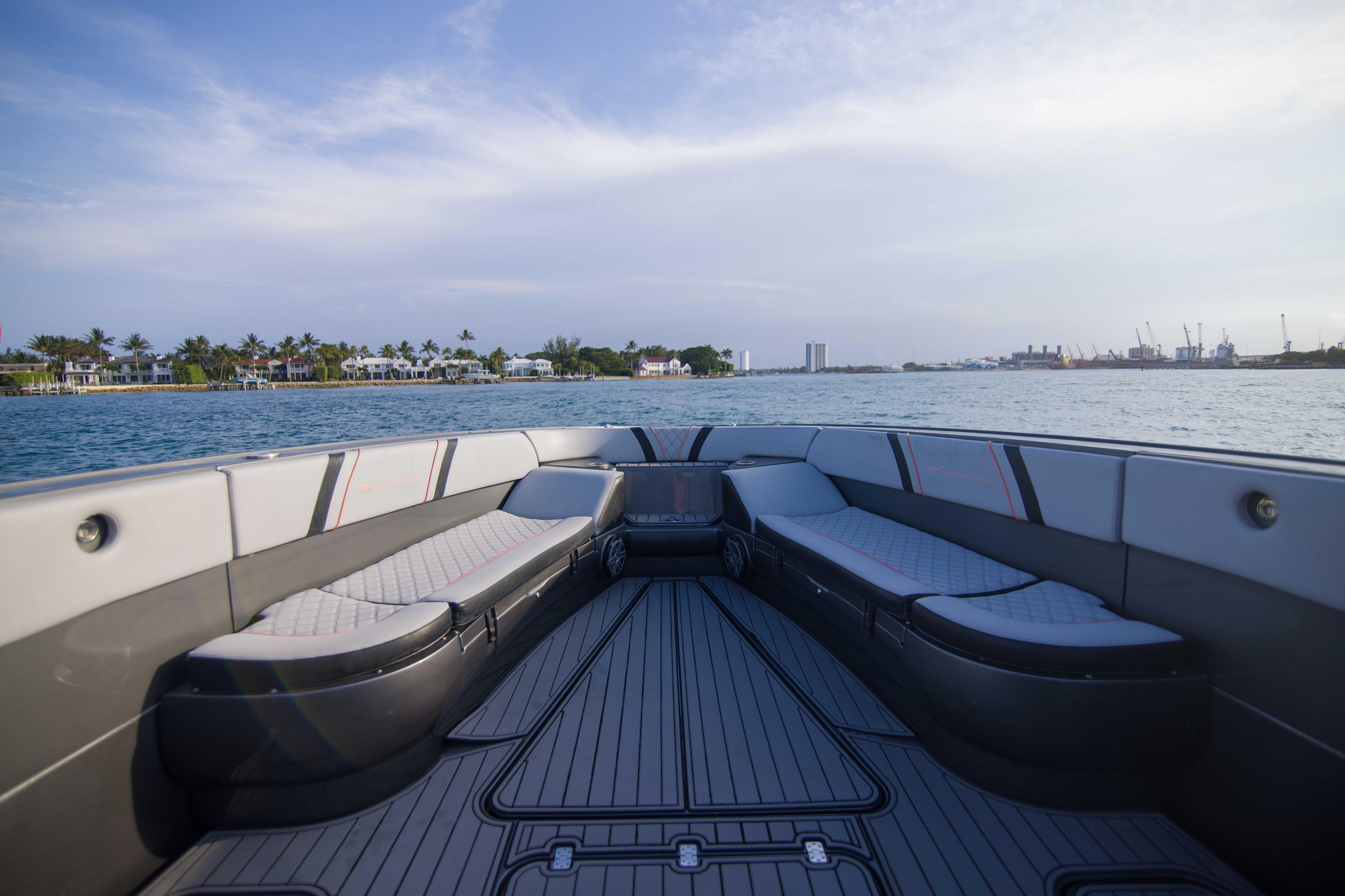 2019 Midnight Express 43 Open boat interior with luxurious seating, cruising on calm waters.