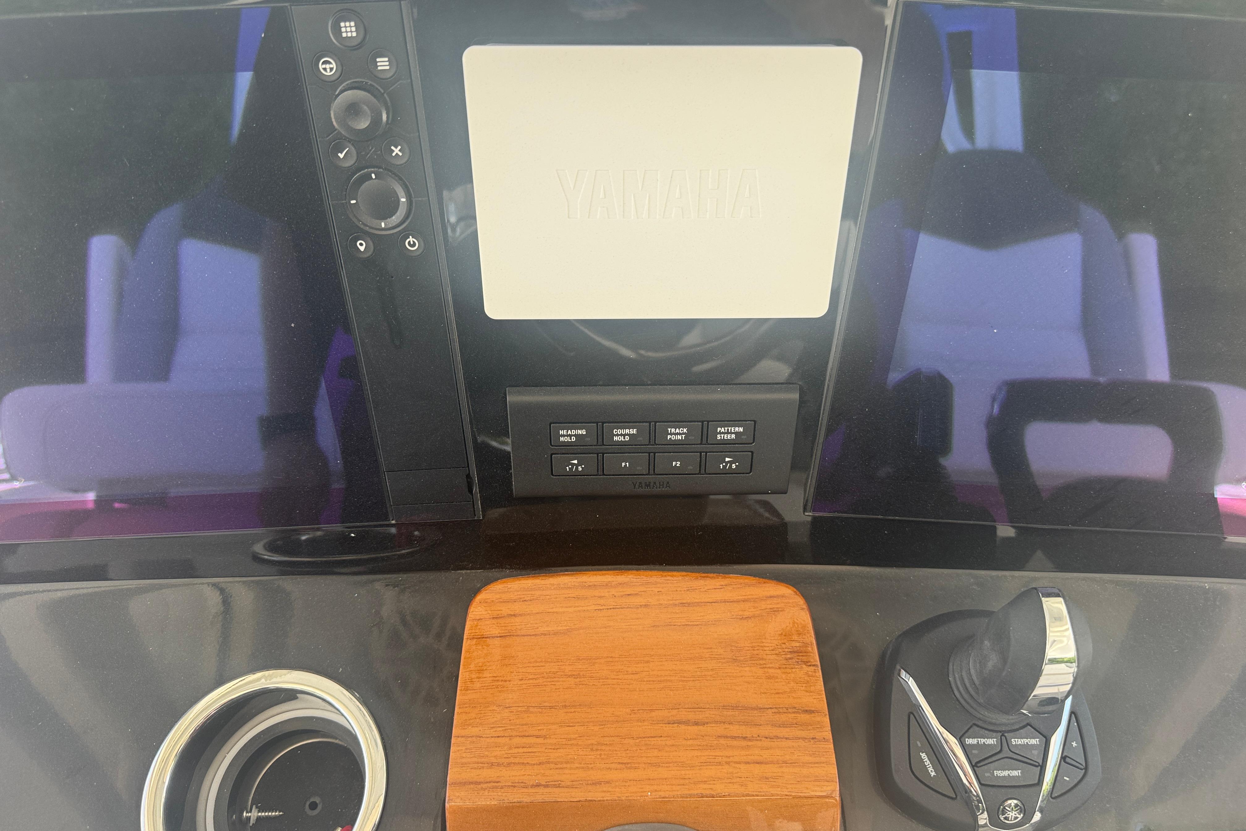 2025 Robalo R300 Center Console dashboard with Yamaha controls and joystick.