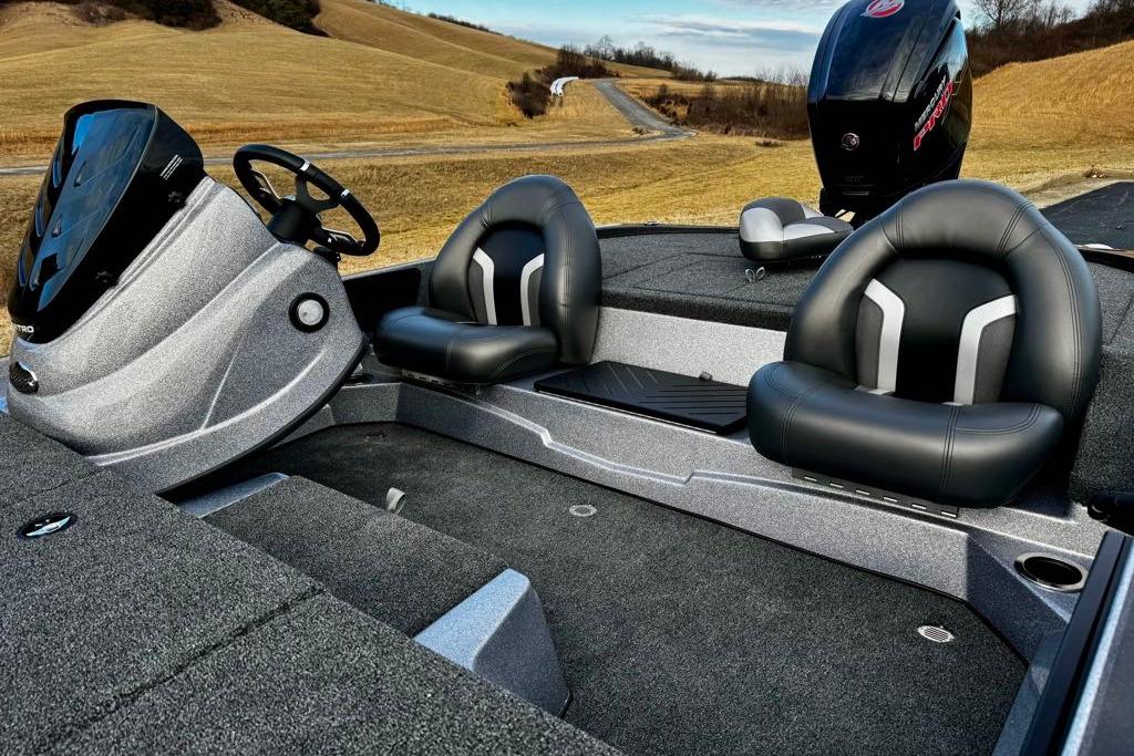 2026 Nitro Z17 boat interior with sleek black seats and modern dashboard design.