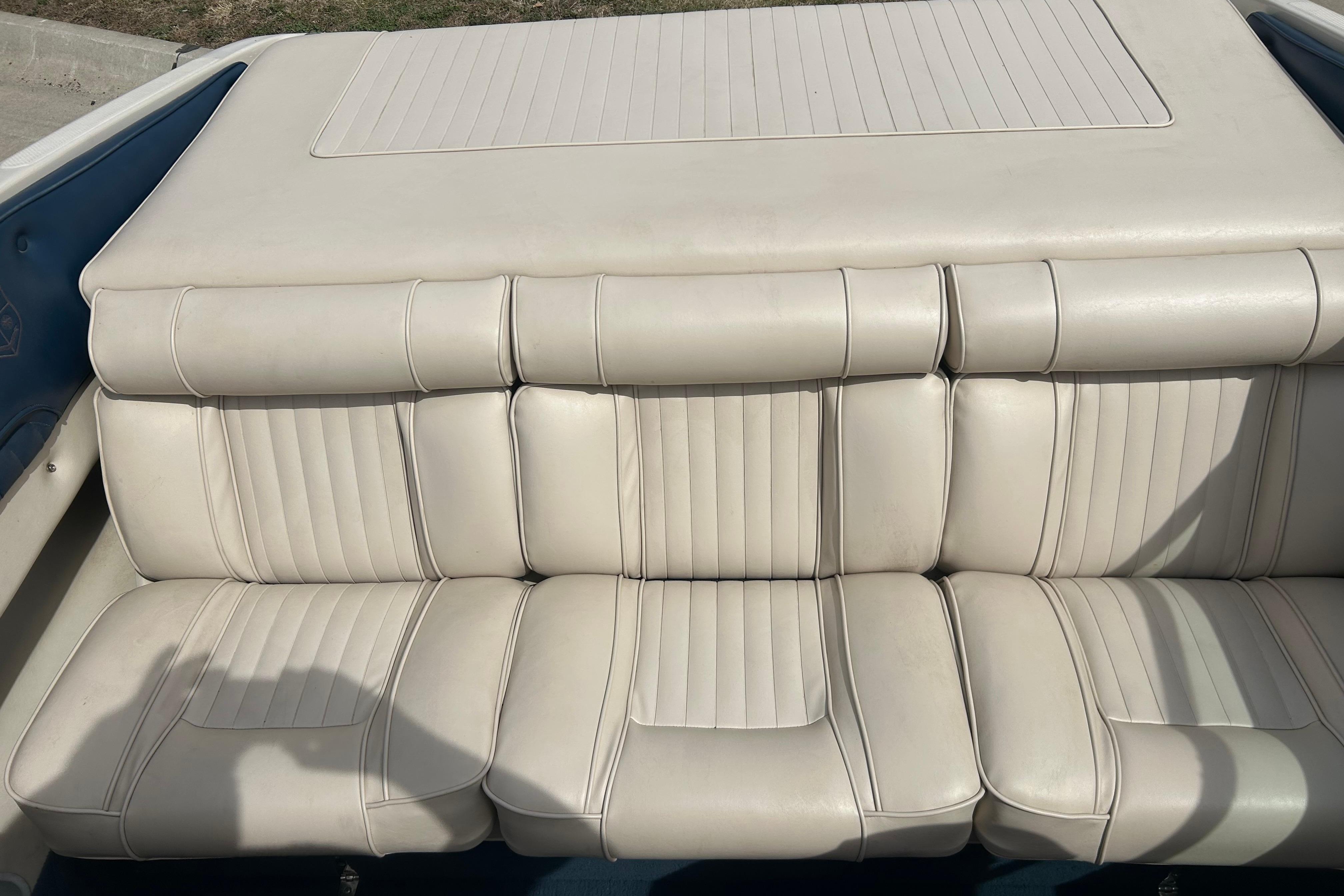 Cream leather seats in a 1996 Mariah 180 Shabah boat interior.