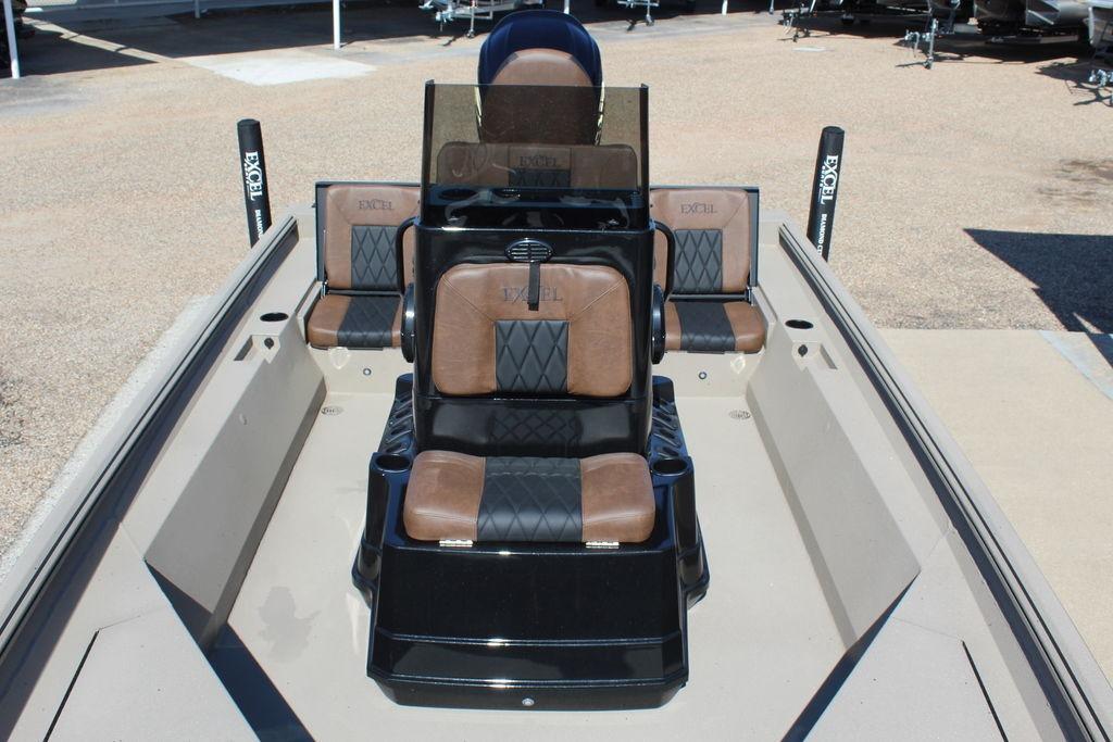 2026 Excel Bay Pro Elite 230 boat interior with brown and black seating.