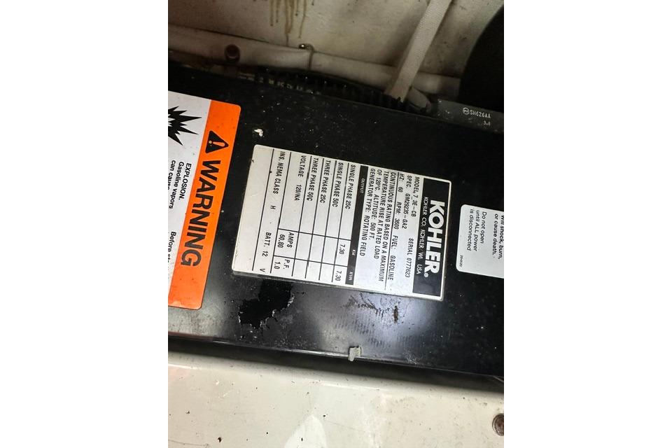 Warning label and specifications on Kohler generator in 2004 Carver 360 Mariner.