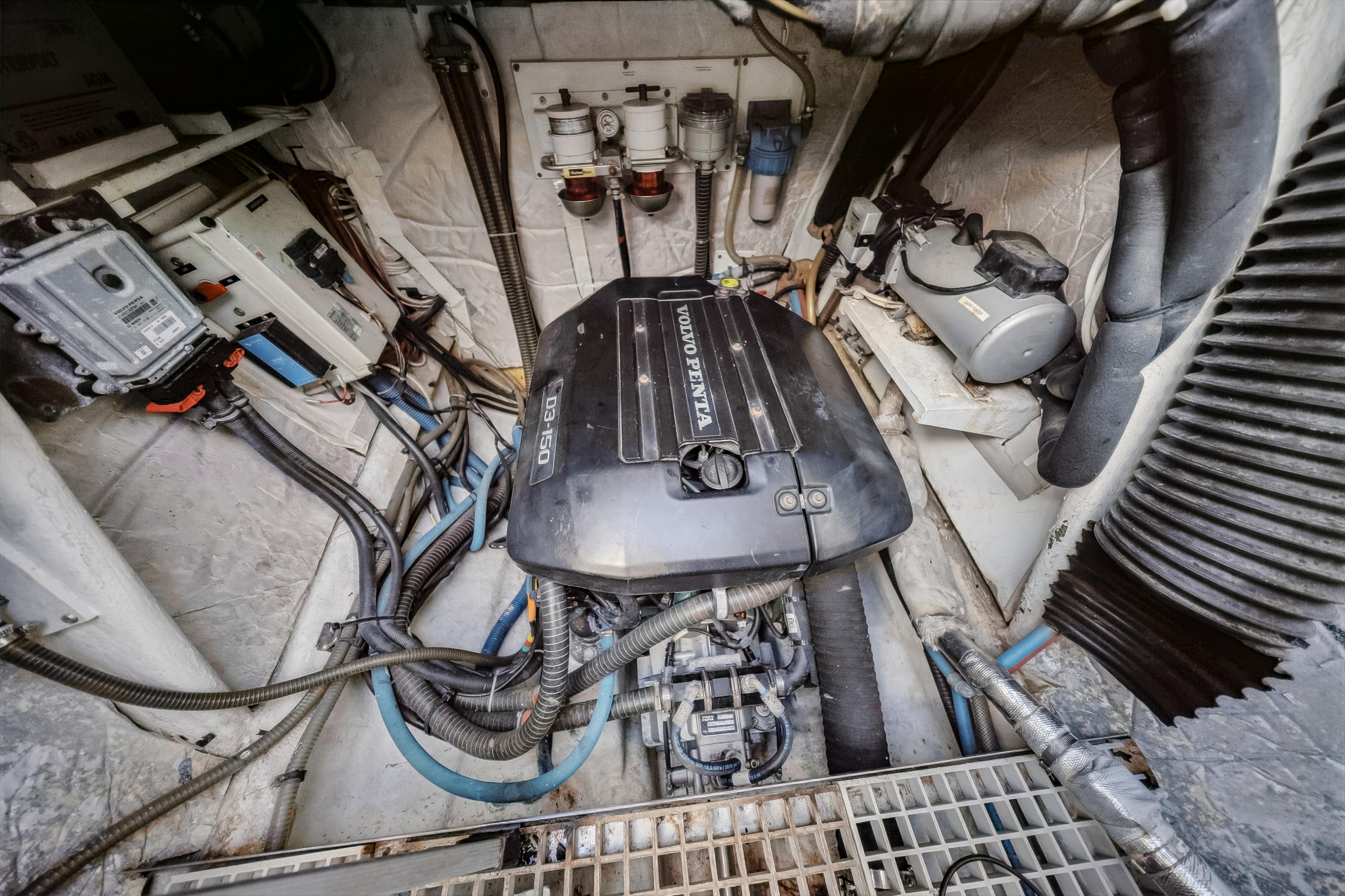 Engine room of a 2009 Catana 65 yacht featuring a Volvo Penta D3-150 engine.