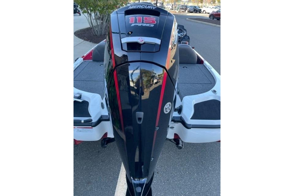 2026 Nitro Z17 boat with Mercury 115 Pro XS outboard motor, parked on pavement.