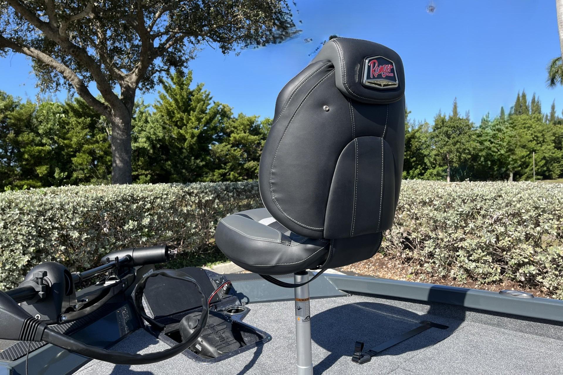 2026 Ranger RT188P boat seat with lush greenery background.