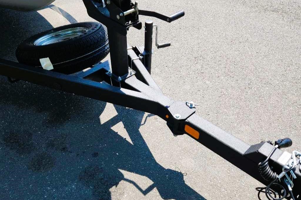 Trailer hitch of 2026 Tracker Pro Guide V-175 Combo on asphalt surface.