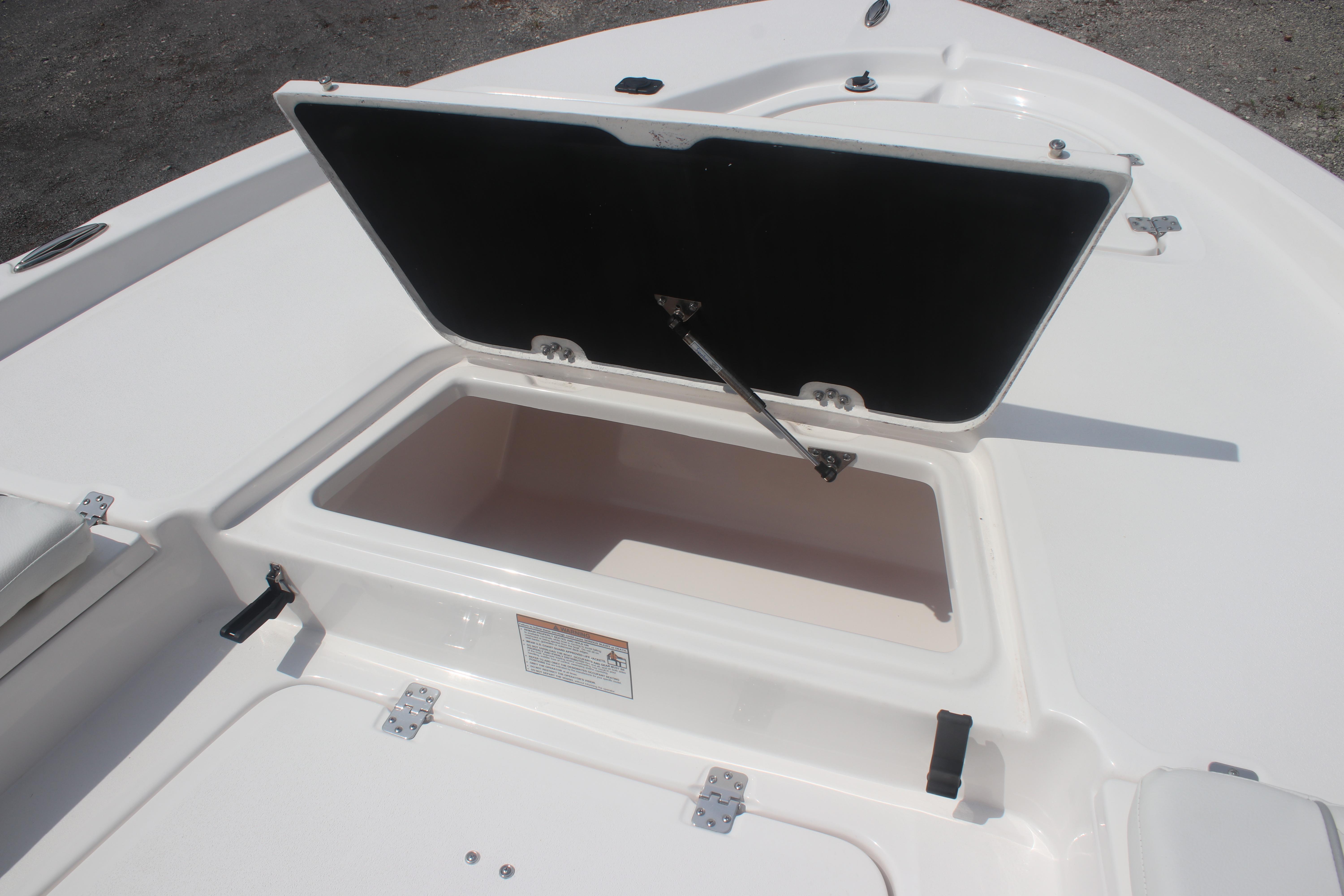 Open storage compartment on 2025 Sea Fox 231 Bay Fox boat deck.