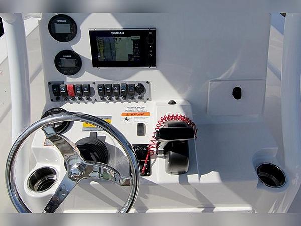 2023 Sea Born LX22 Center Console dashboard with steering wheel and navigation controls.