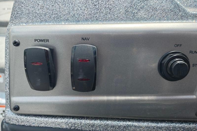 Control panel of a 2026 Nitro Z19 XL boat with power and navigation switches.