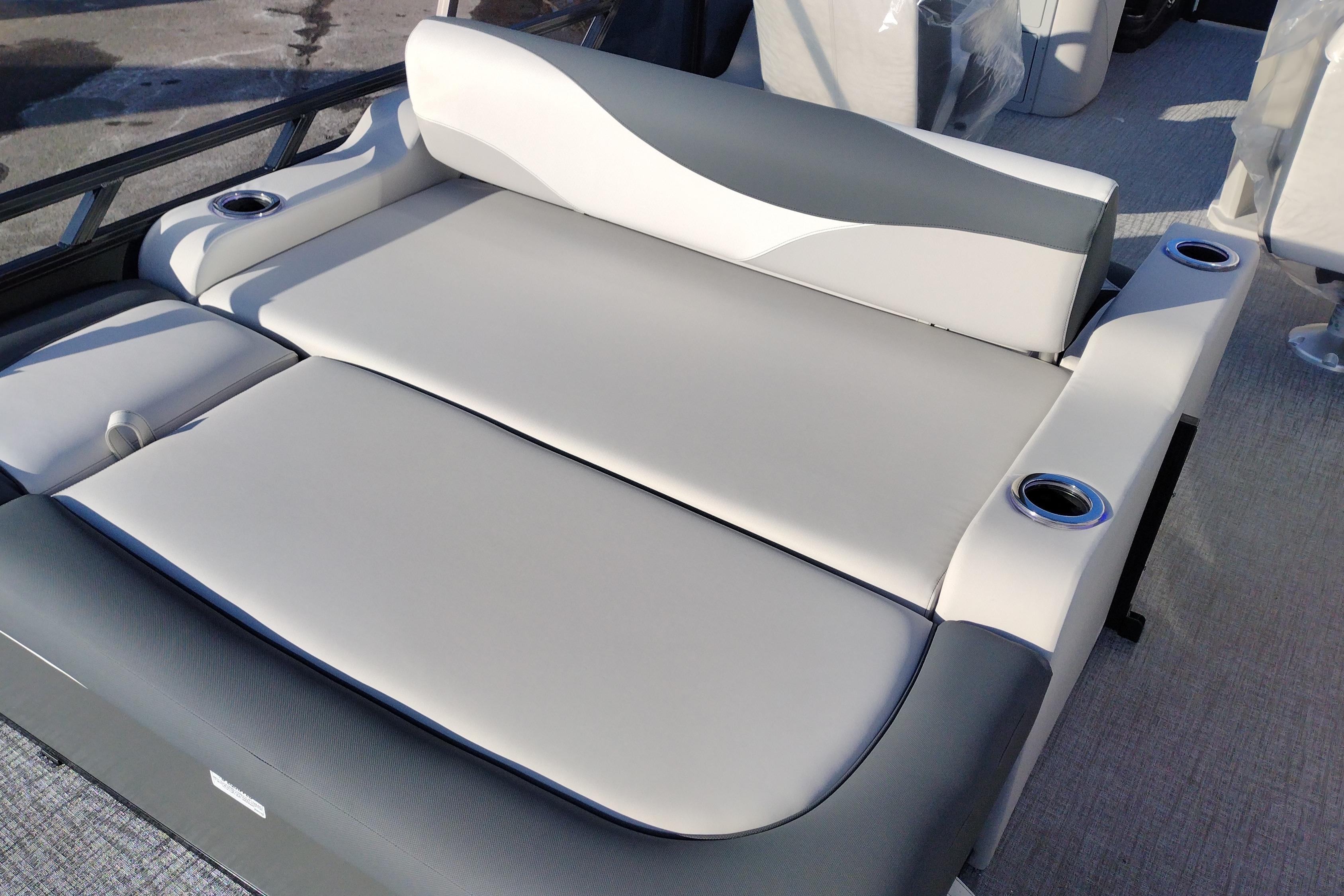 2026 Tahoe Pontoon 25E85 LTZ Rear Bench with sleek gray and white upholstery.