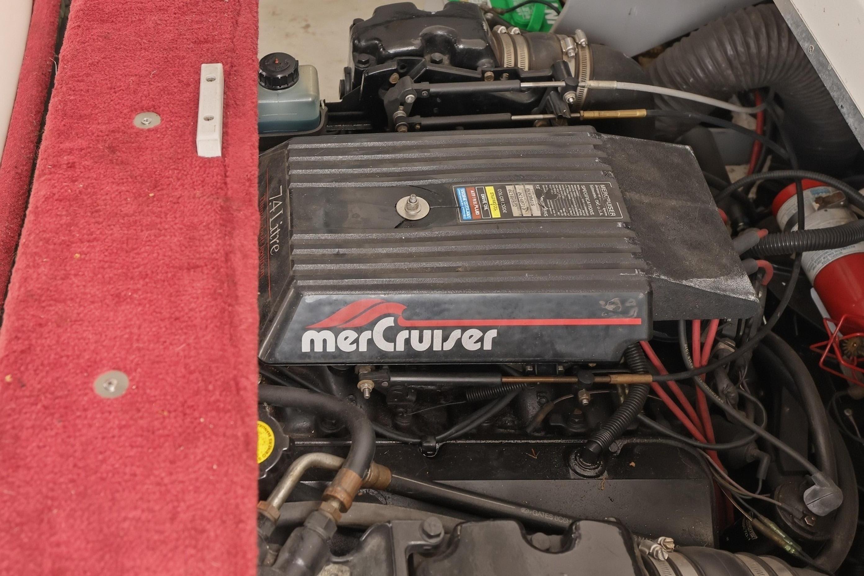 Engine of a 1997 Sea Ray 230 Signature boat.