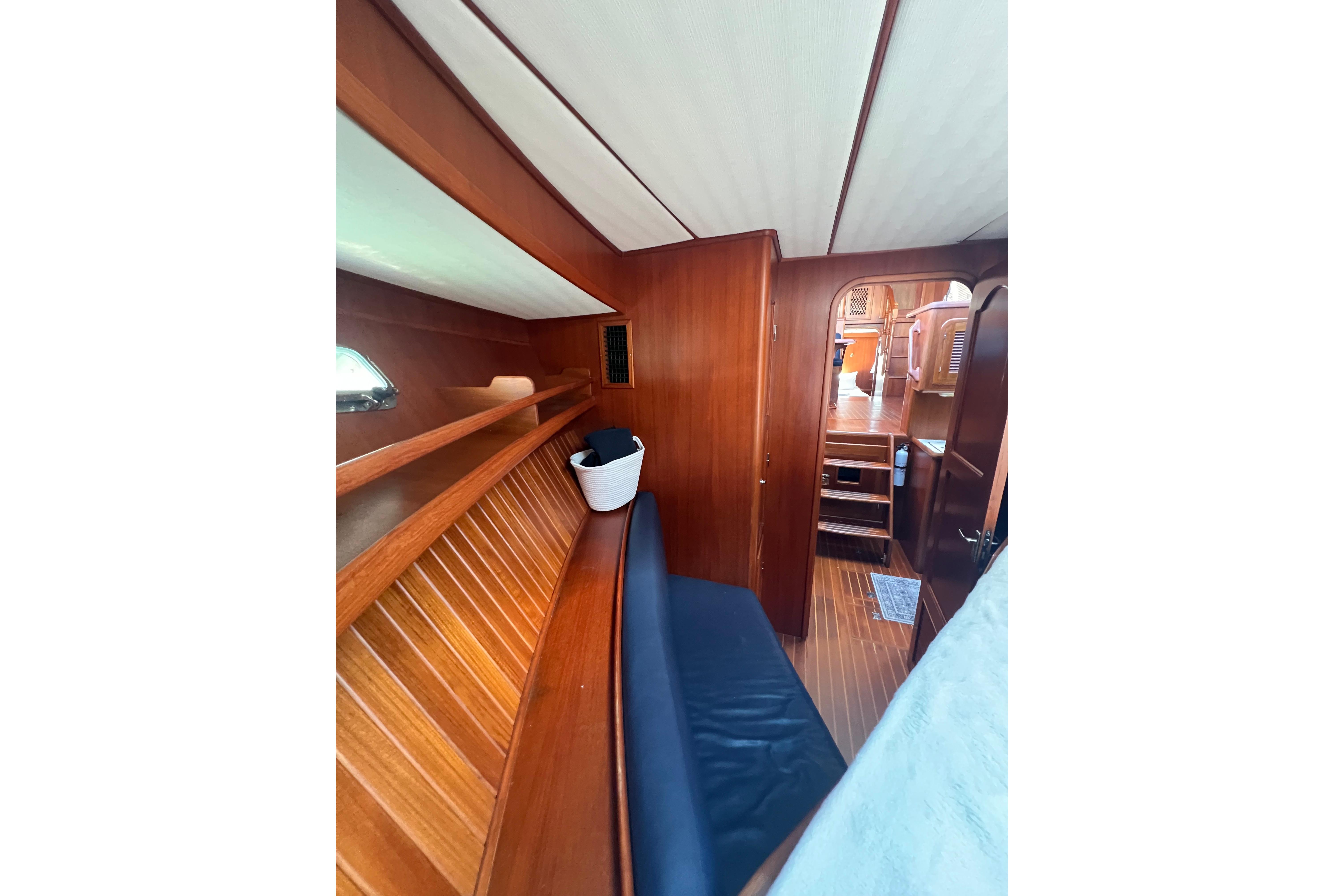 Interior of 2007 Heritage East 36 Sundeck Trawler with wooden paneling and seating.