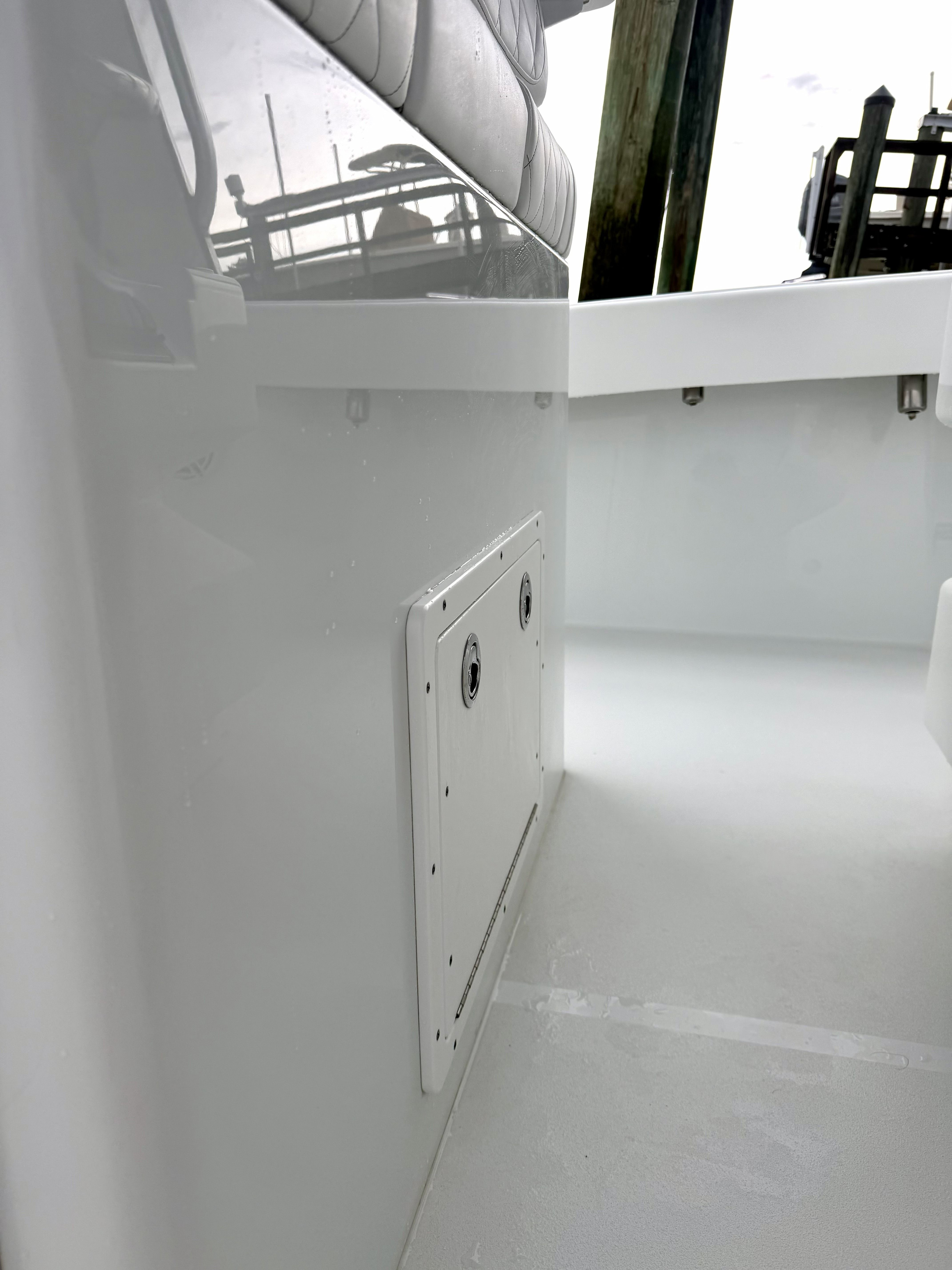Close-up of the deck on a 2018 Freeman 34VH boat with white surfaces.