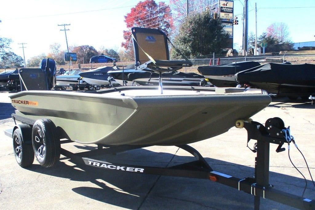 2026 Tracker Grizzly 1756 T Marsh boat on trailer in outdoor setting.