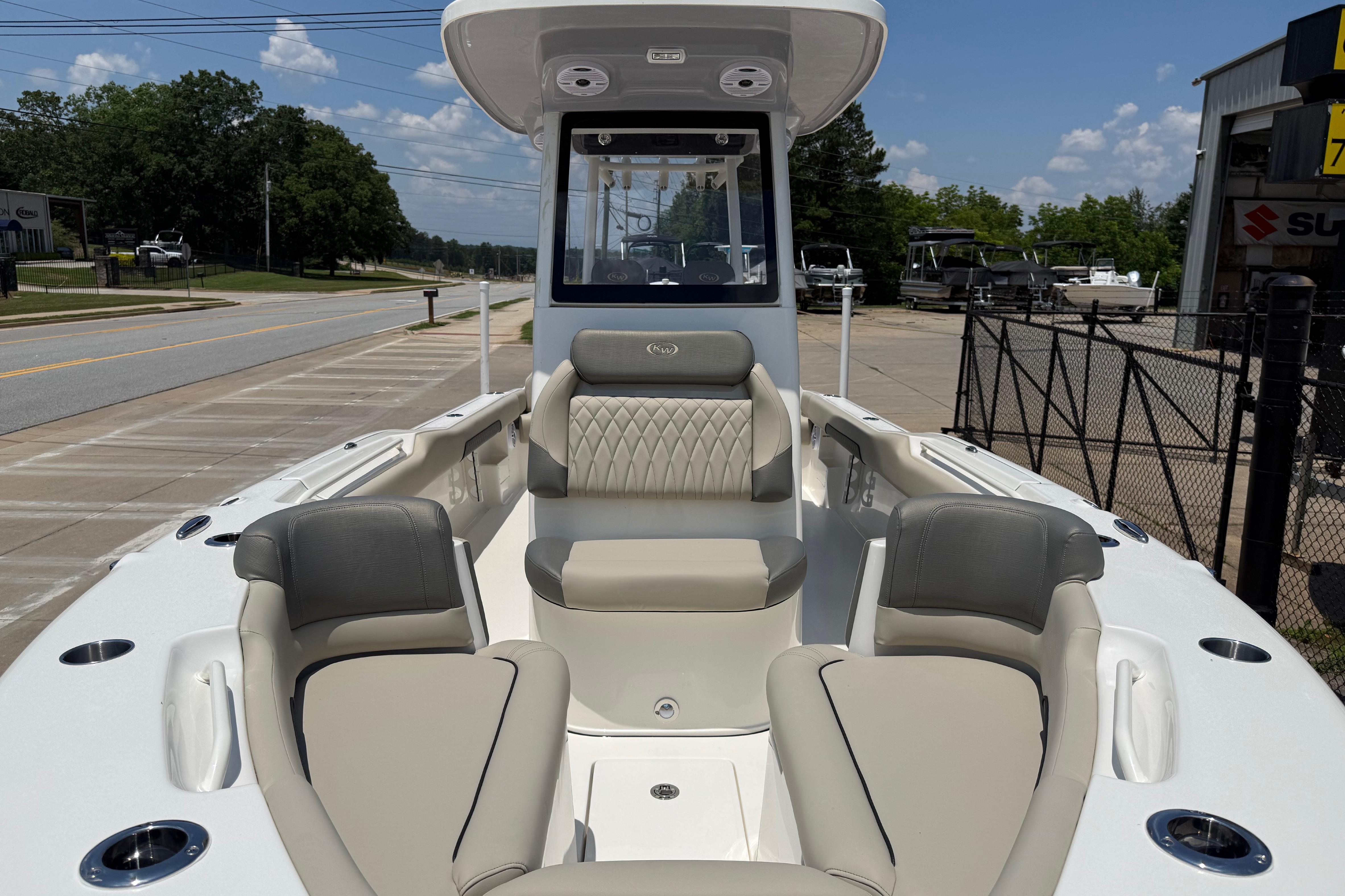 2027 Key West 249 FS boat interior with cushioned seating and modern design.