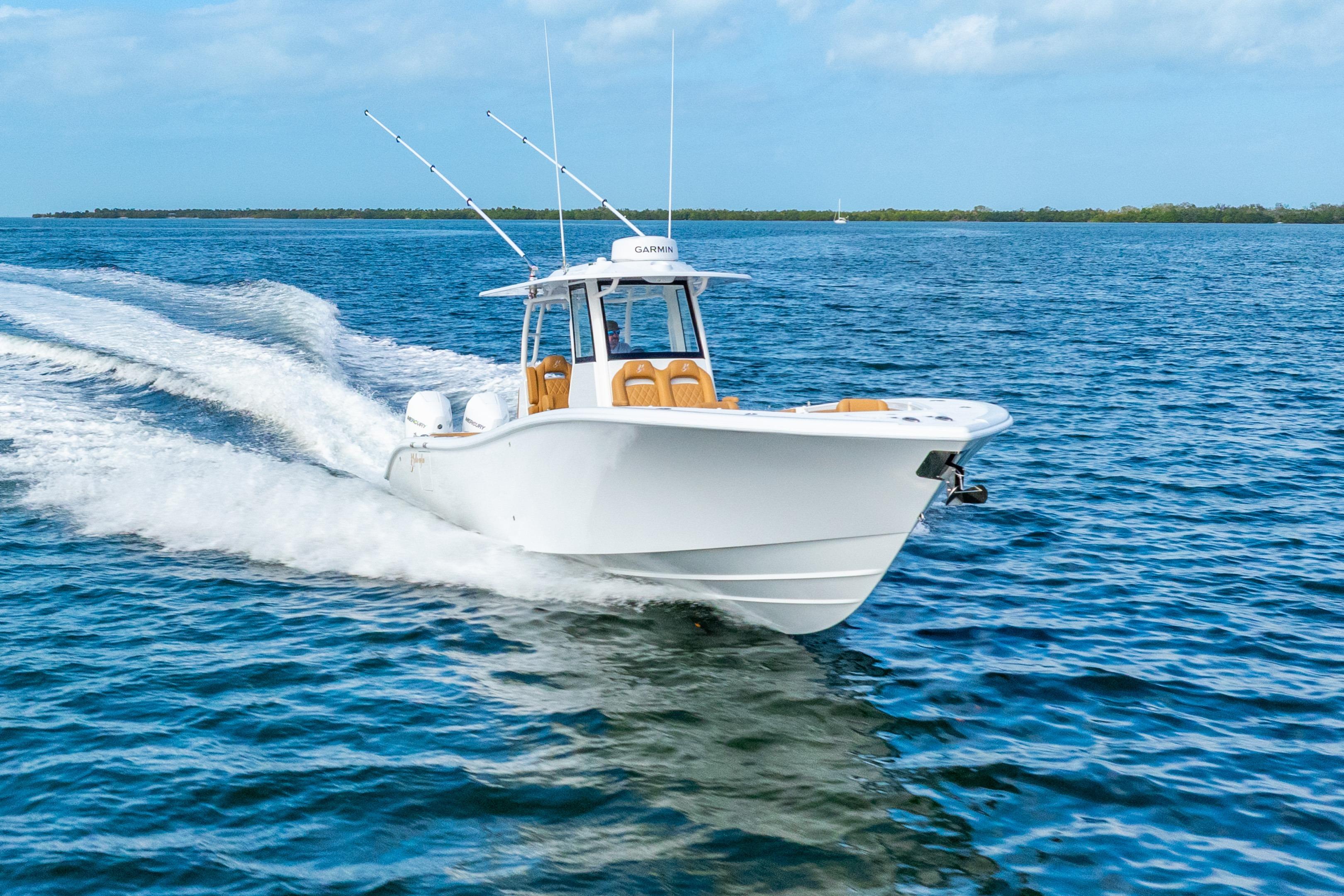 2026 Yellowfin 36 Offshore boat cruising on open sea.