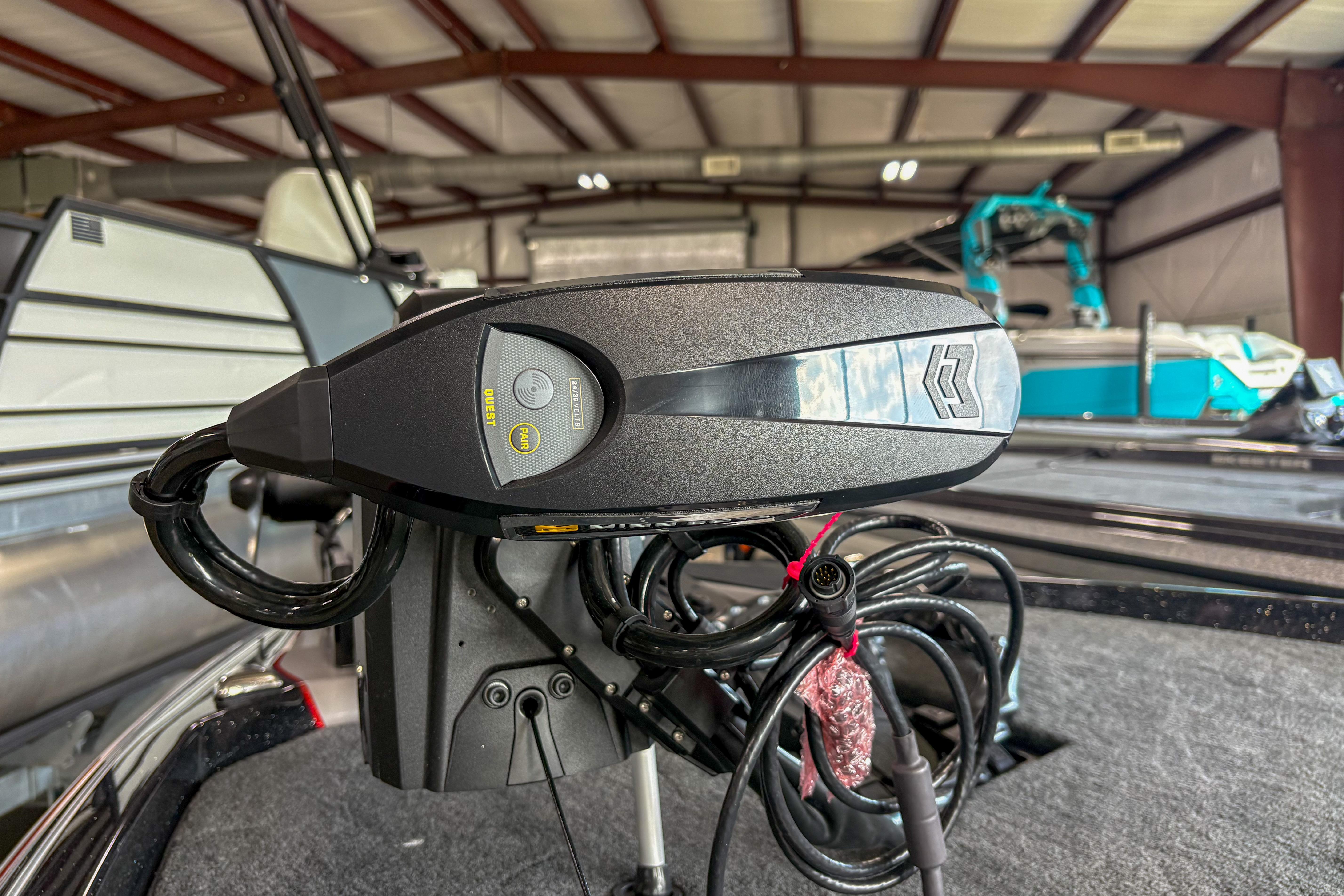 2026 Skeeter ZXE20 boat motor in a showroom, showcasing advanced technology and design.