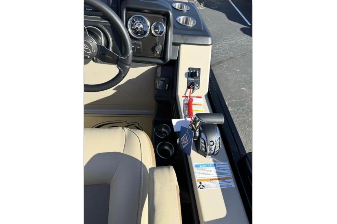 2025 Veranda VR25RC XL boat dashboard with steering wheel and control panel.