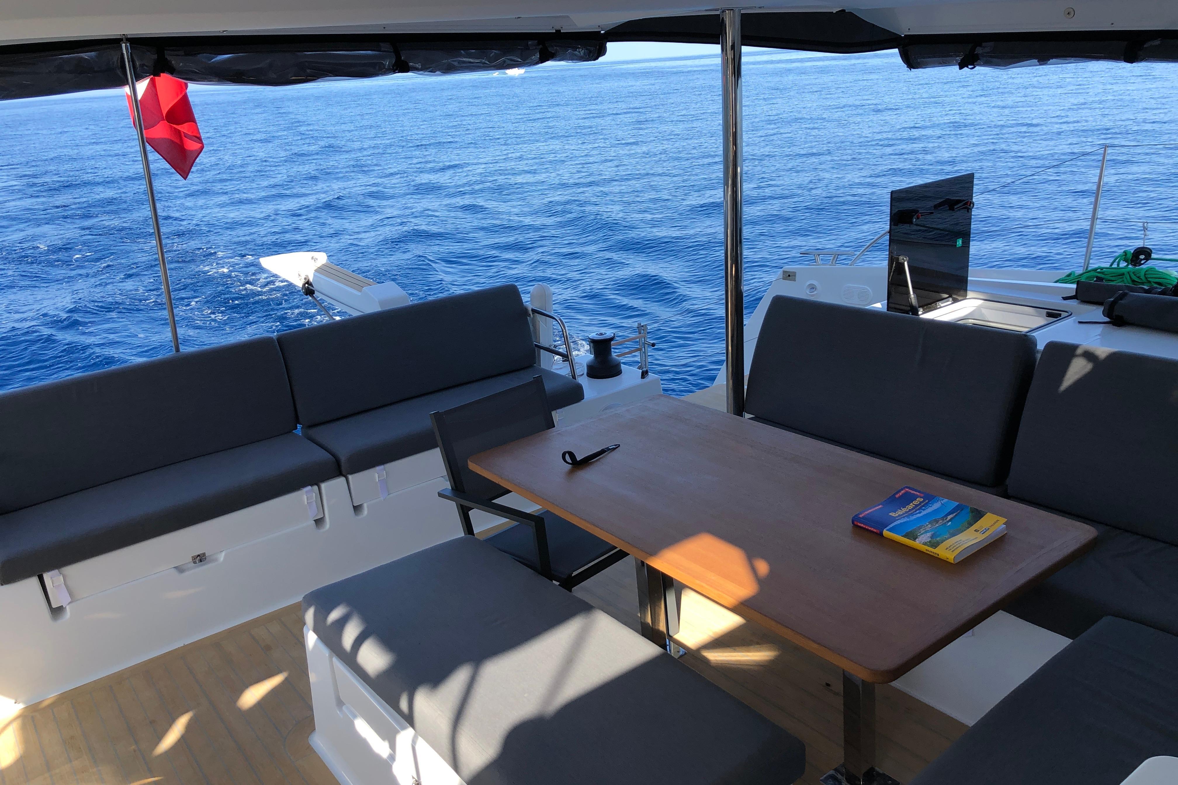 Spacious deck of 2020 Fountaine Pajot Saona 47 catamaran with ocean view.