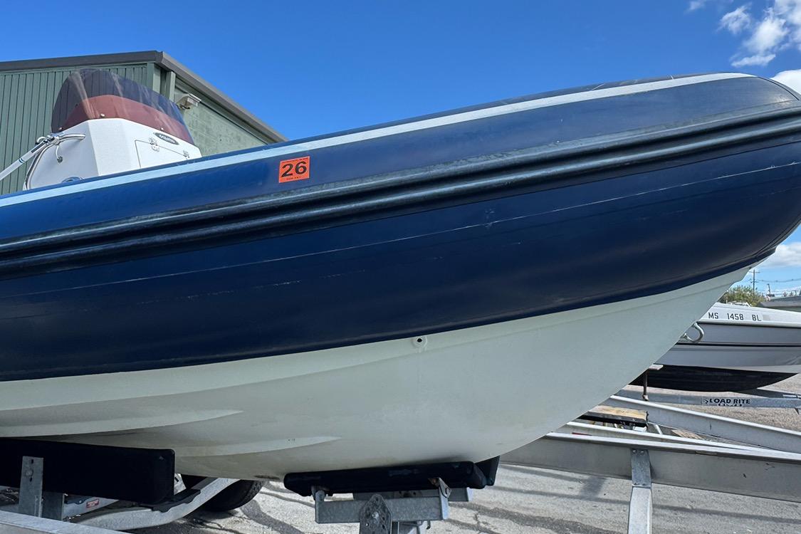 2020 AB Inflatables Oceanus 21 VST boat on trailer, blue and white hull.