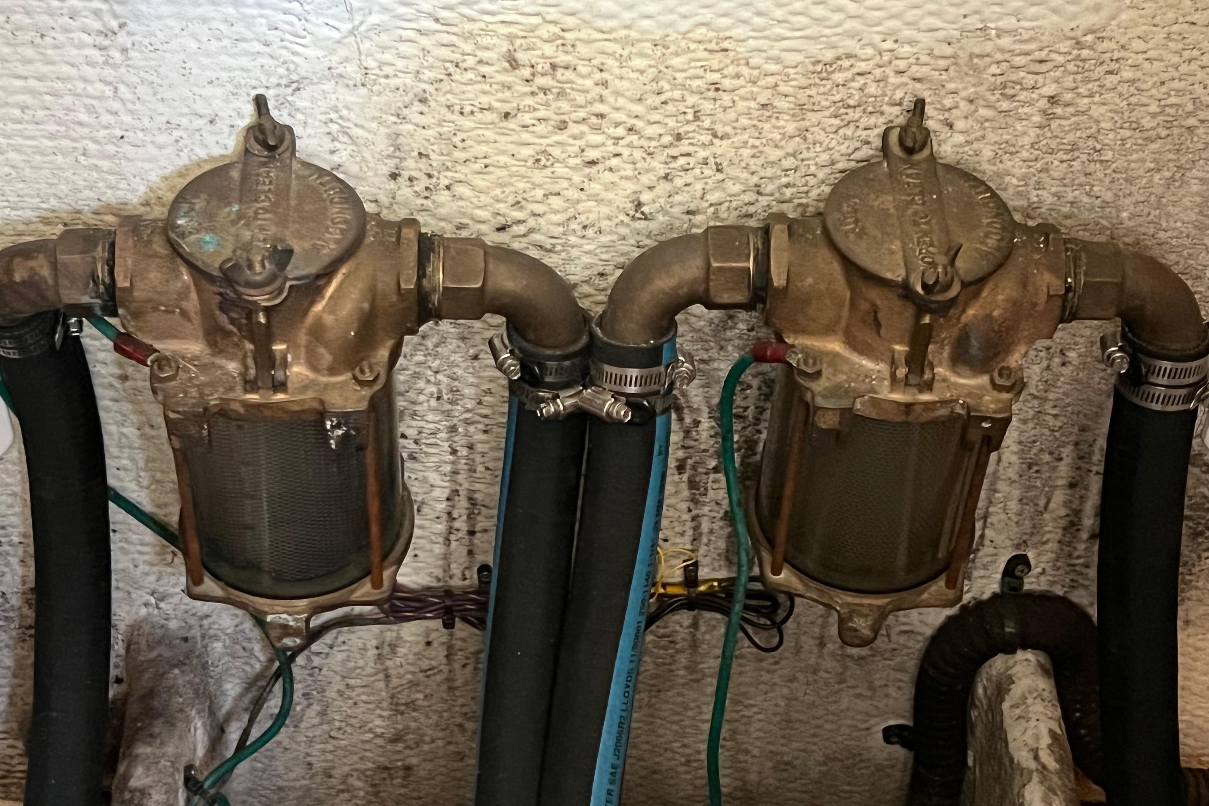 Engine room components of a 2006 Silverton 38 Sport Bridge boat.