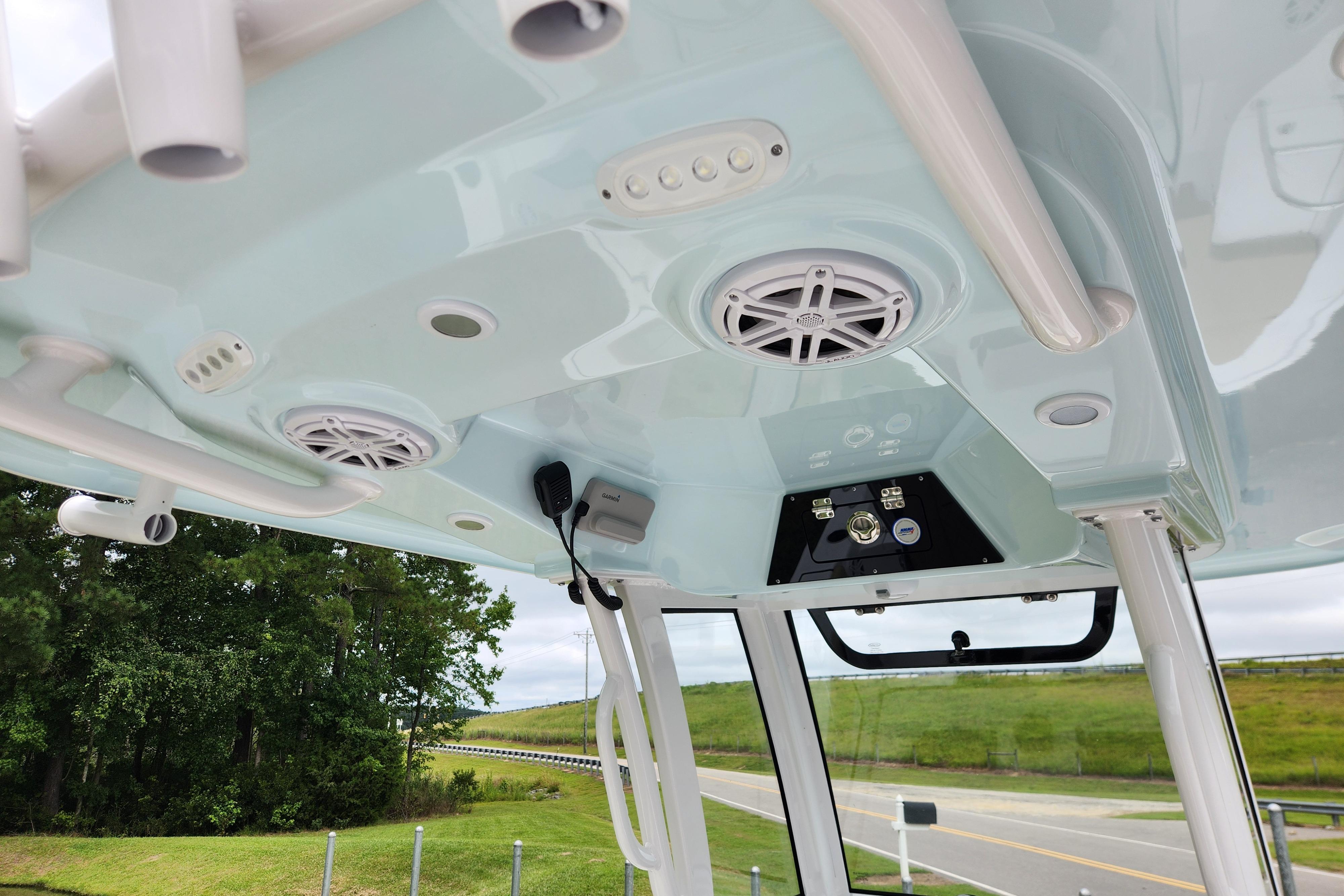 2026 Sportsman Masters 247 Bay Boat interior with speakers and control panel.