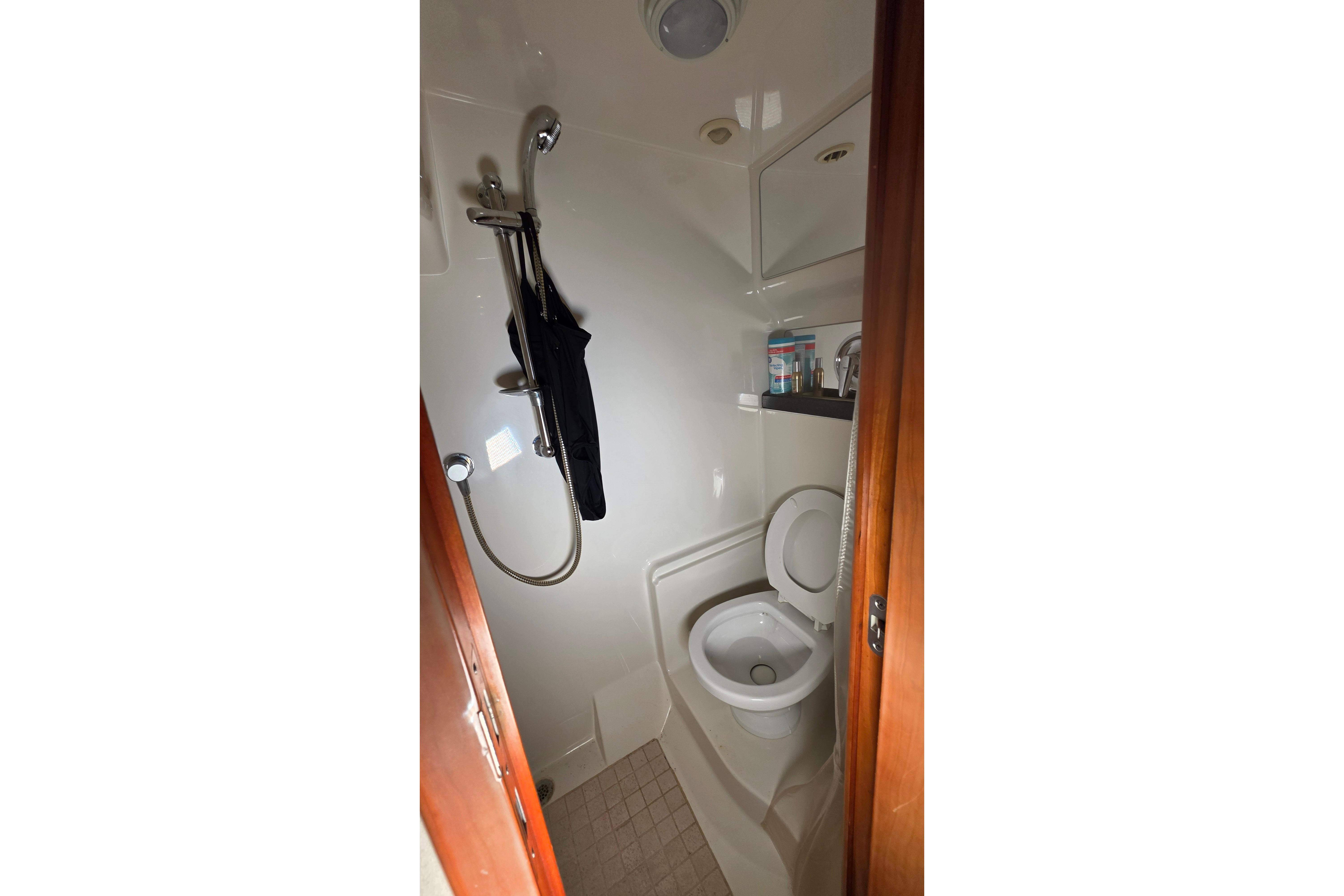 2002 Regal Commodore 4260 yacht bathroom with shower and toilet.