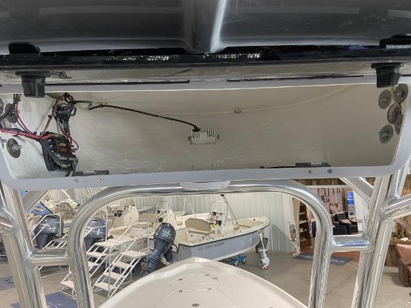 2024 Key West 250 Bay Reef boat interior wiring and storage compartment.