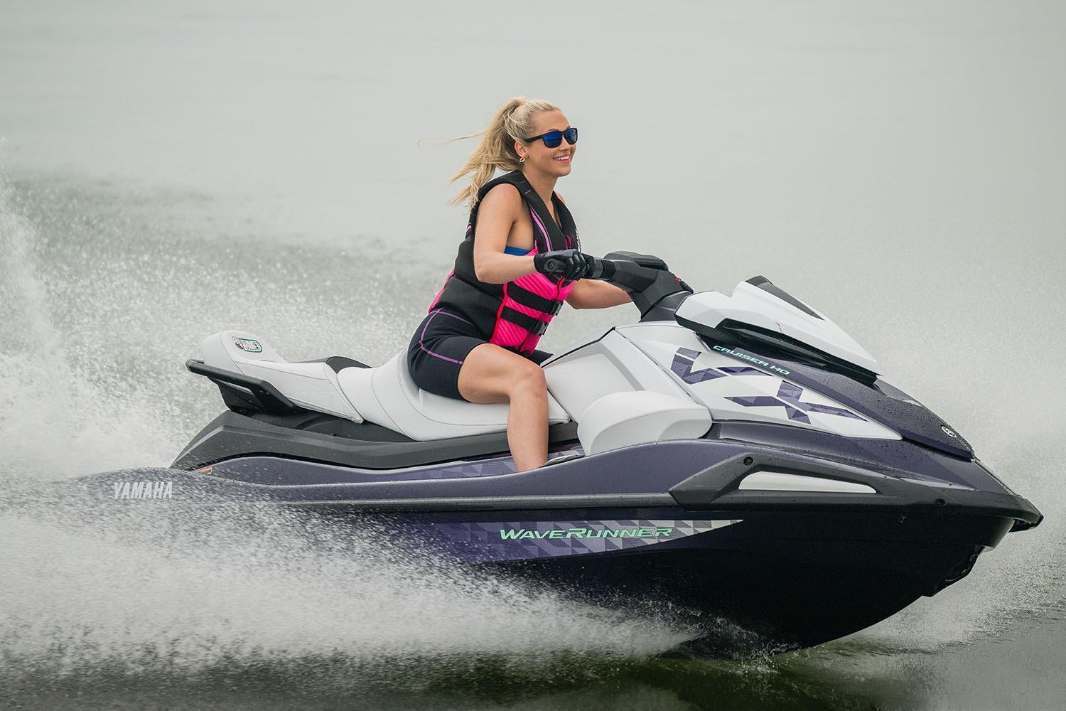 Manufacturer Provided Image: 2026 Yamaha WaveRunner VX Cruiser HO on water, rider wearing sunglasses and life vest.