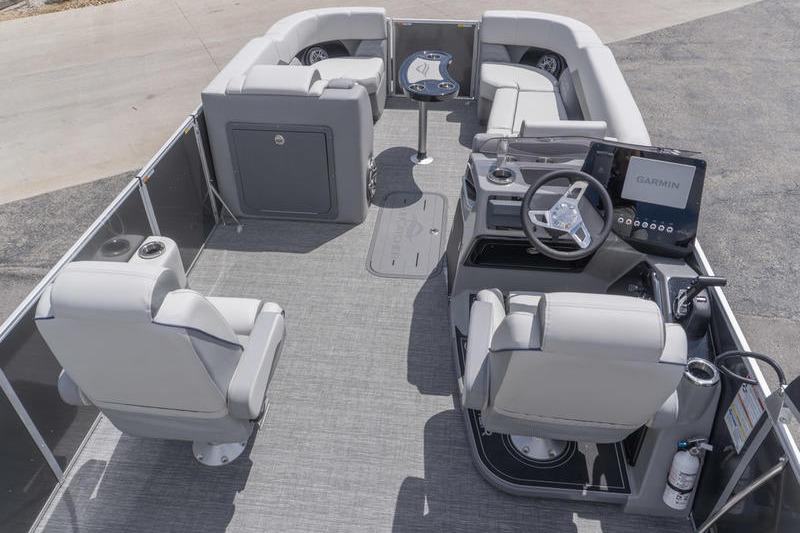 2026 SunCatcher Elite 326 SL pontoon boat interior with modern seating and navigation system.