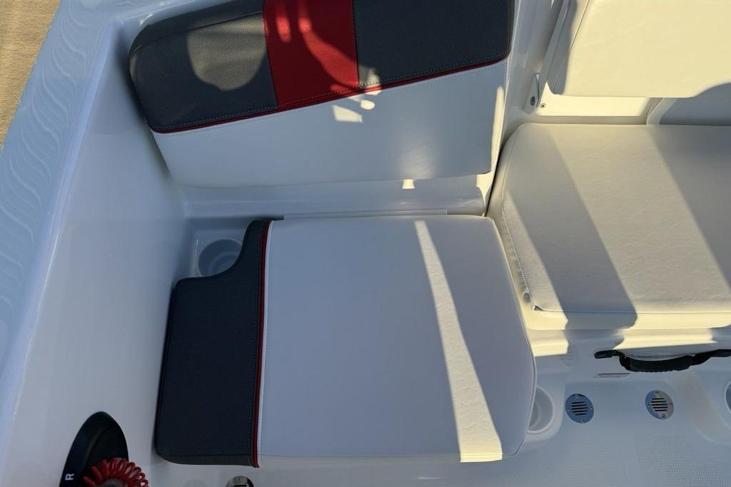 2026 Tahoe T16 boat interior with white and gray seating, featuring red accents.