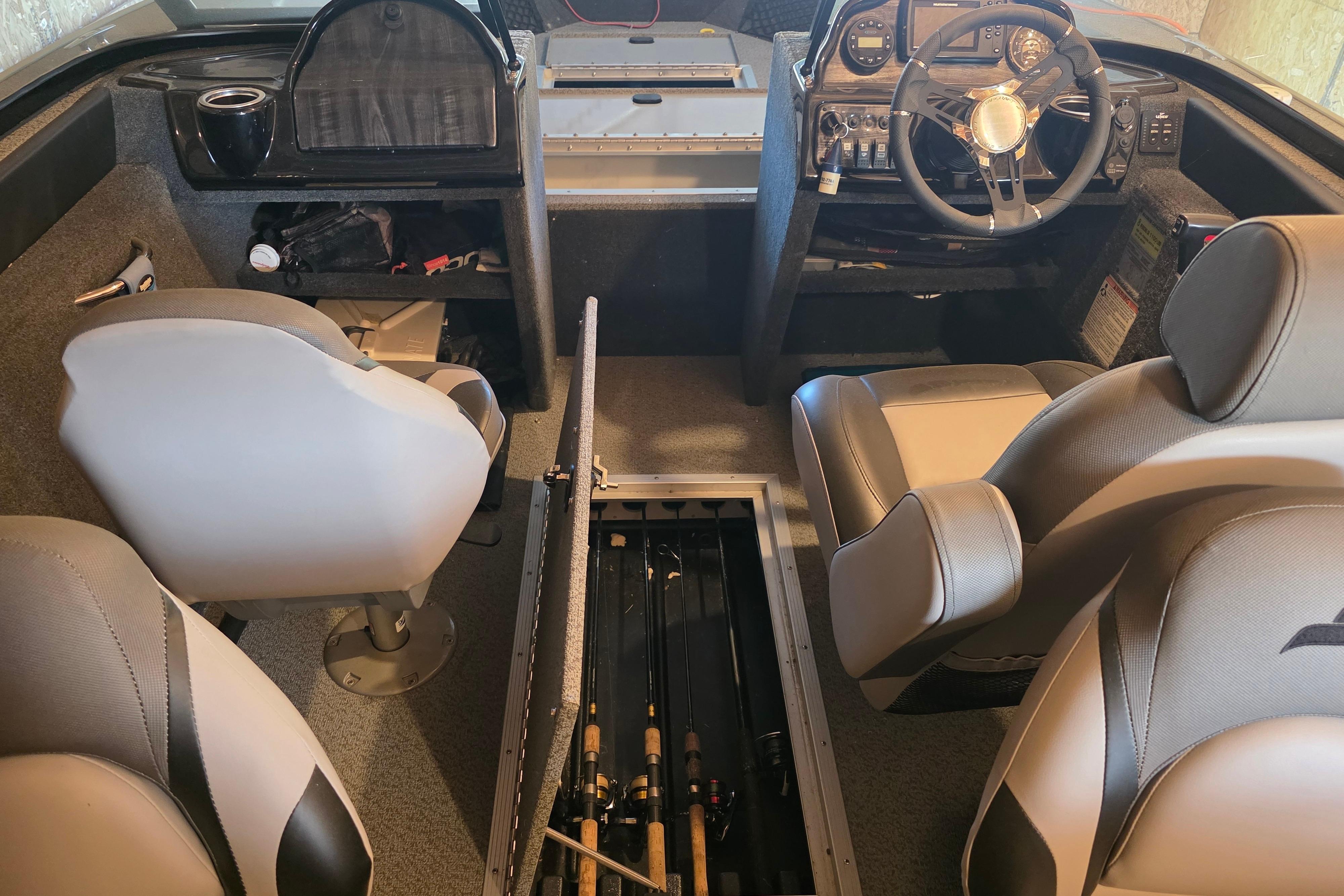 Interior of a 2022 Starweld Fusion Pro 20 DC boat with seating and storage.