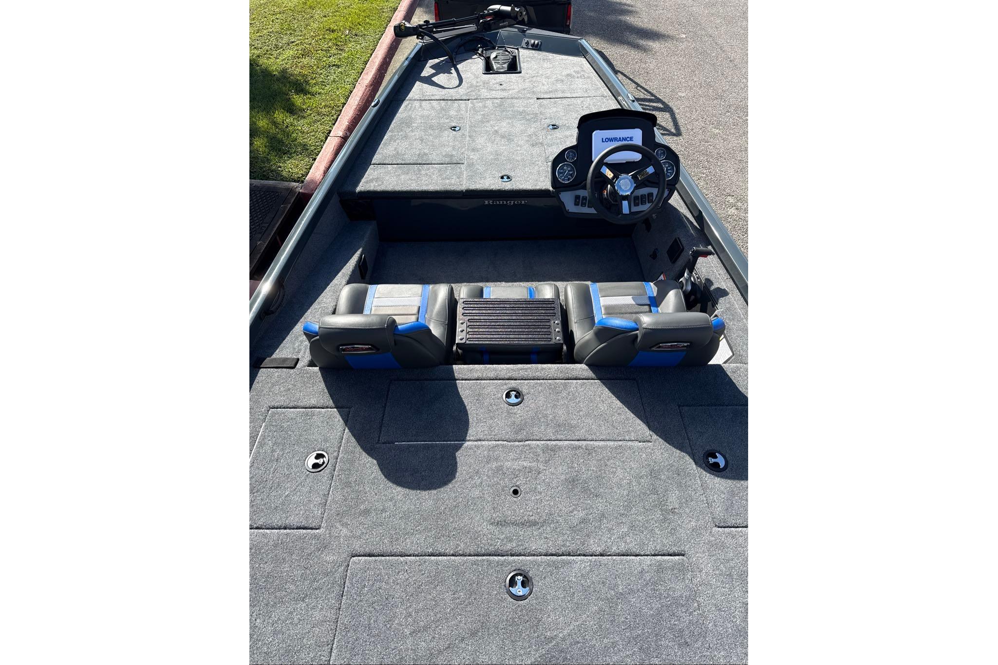 2026 Ranger RT188 boat interior with steering console and seating, featuring a Lowrance system.