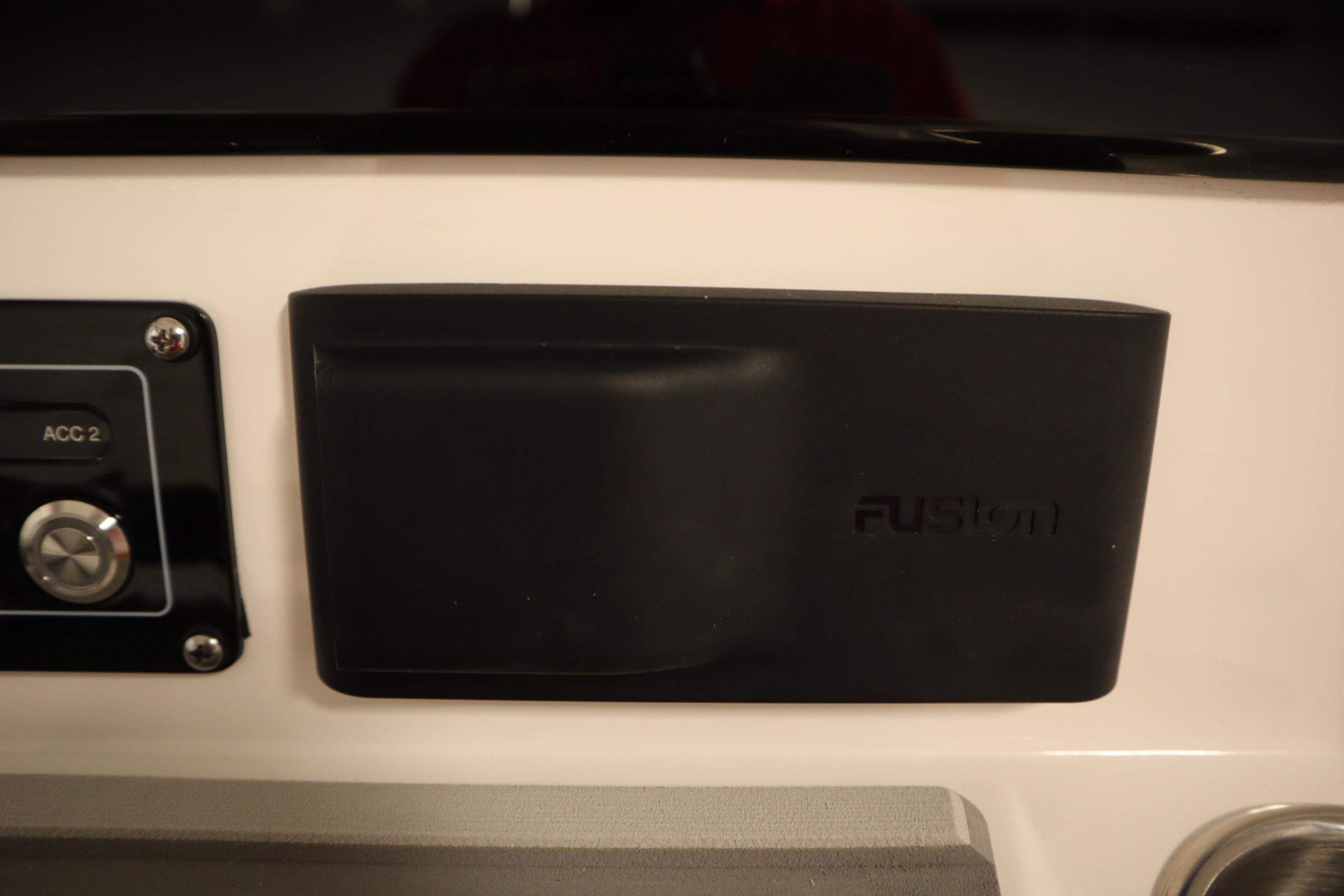 Control panel of 2026 Sea Fox 228 Commander boat with Fusion audio system.