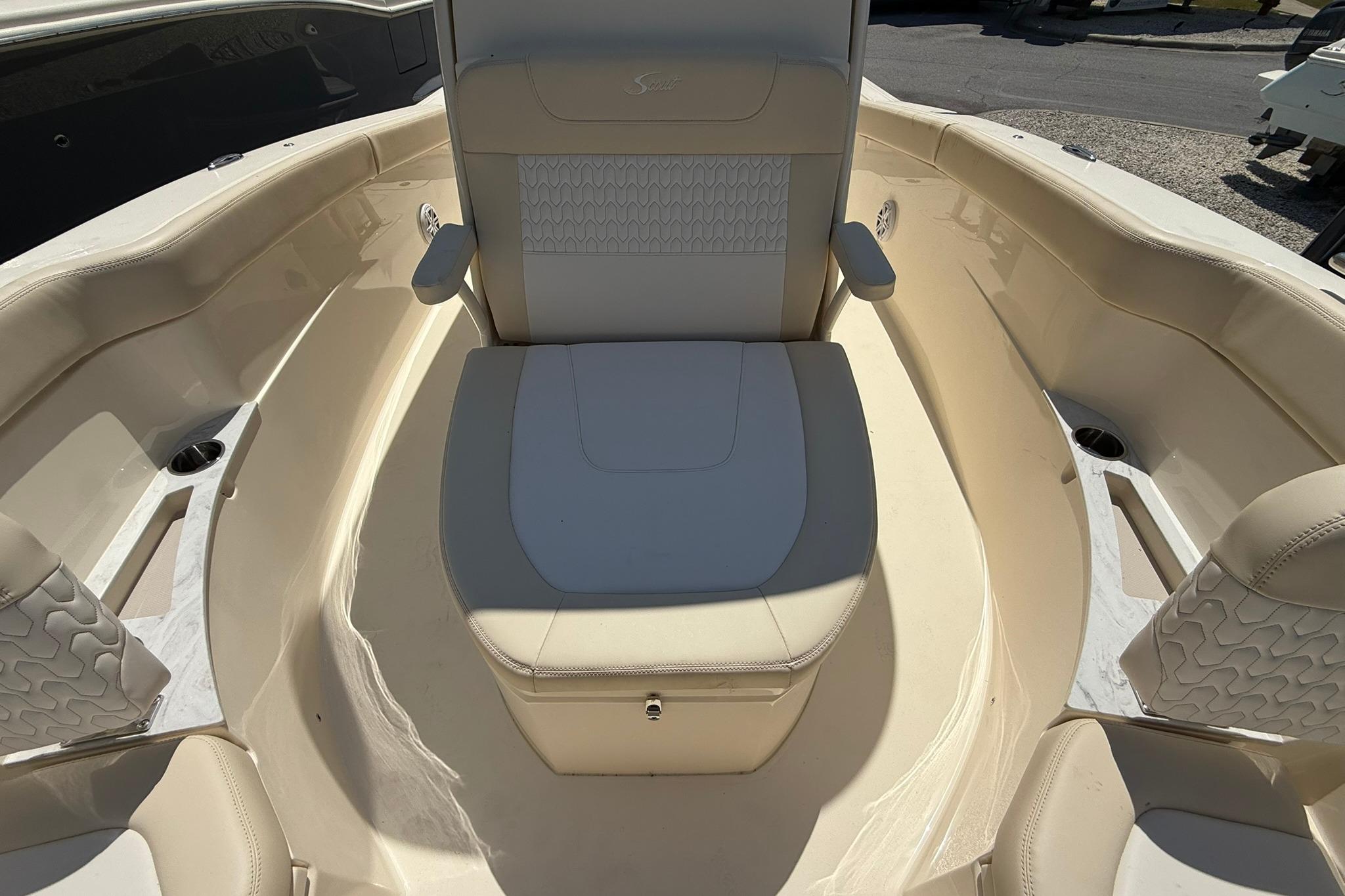 2027 Scout 240 XSF boat interior with cushioned seating and armrests.