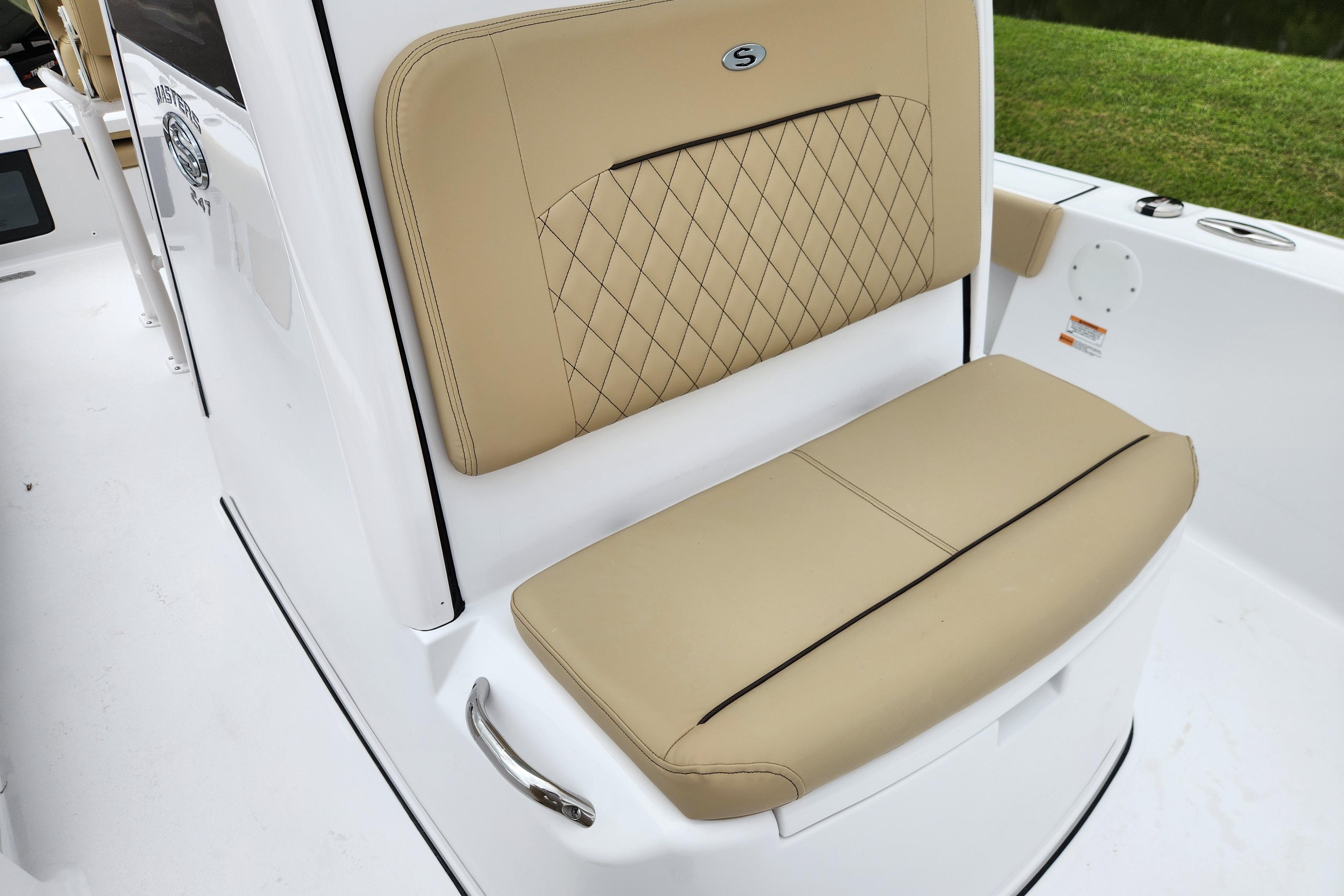 Luxurious seating on 2026 Sportsman Masters 247 Bay Boat with tan upholstery.