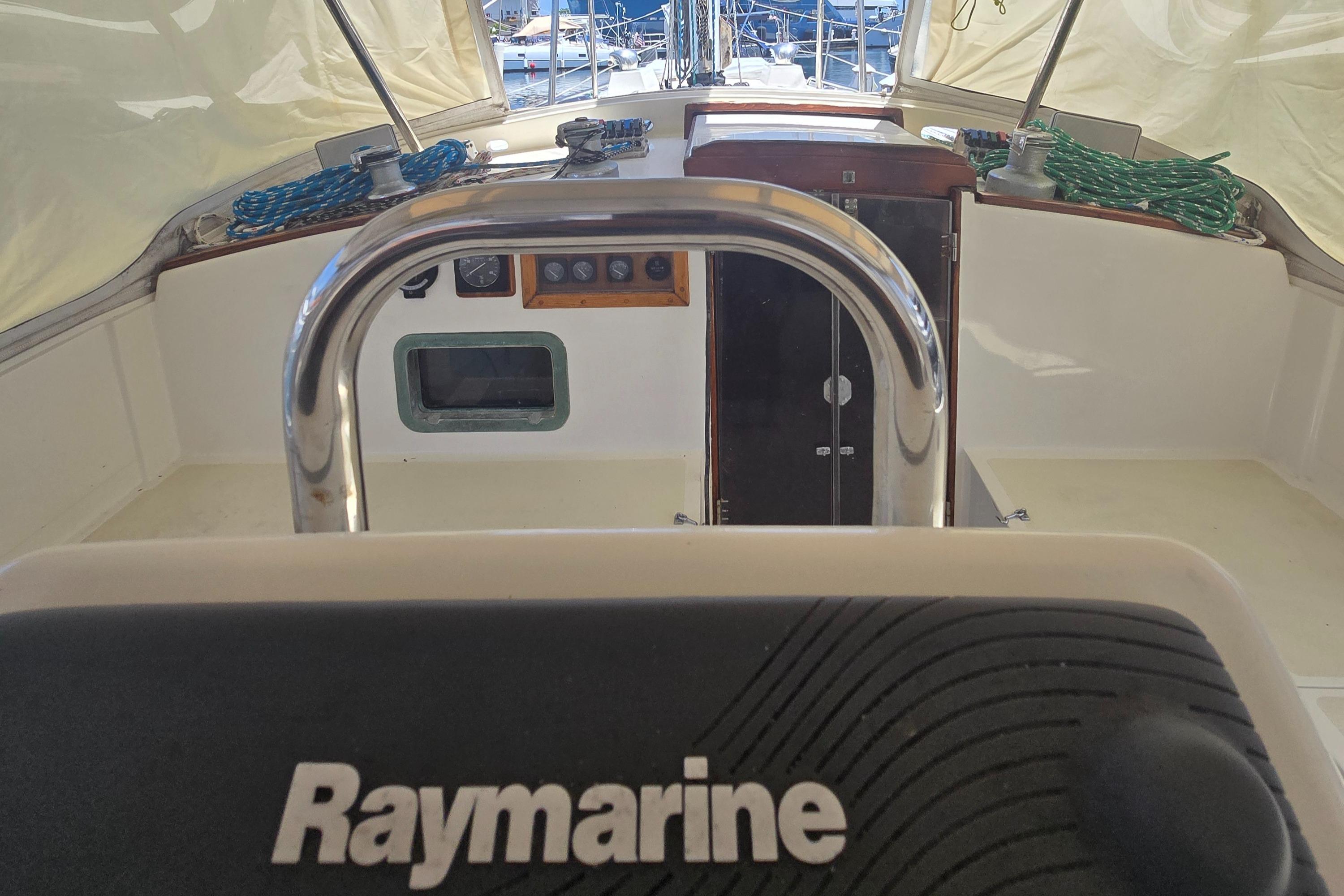Cockpit view of 1978 Herreshoff 50 sailboat with Raymarine equipment.
