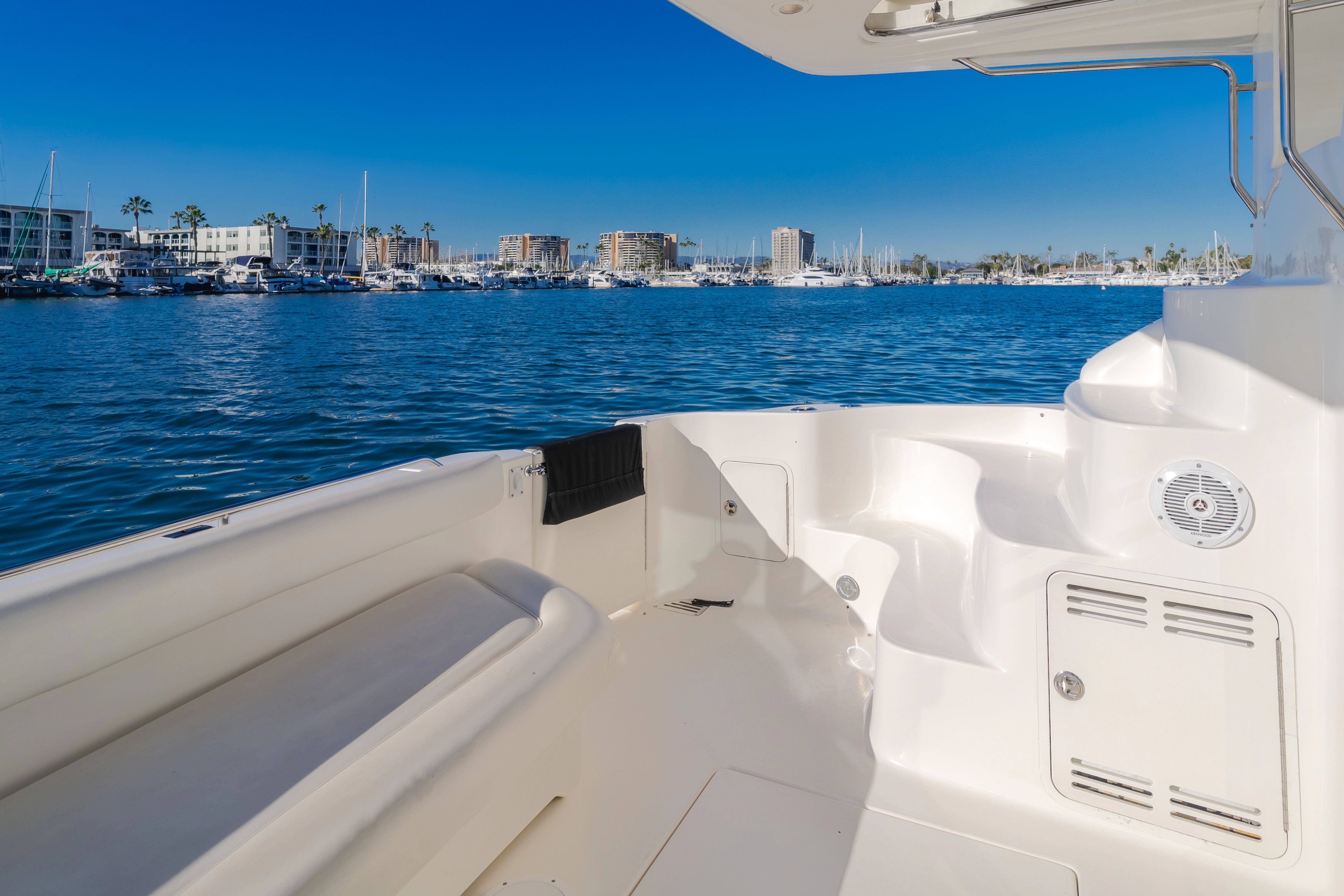 Sea Ray 400 Sedan Bridge 2002 on calm harbor waters.