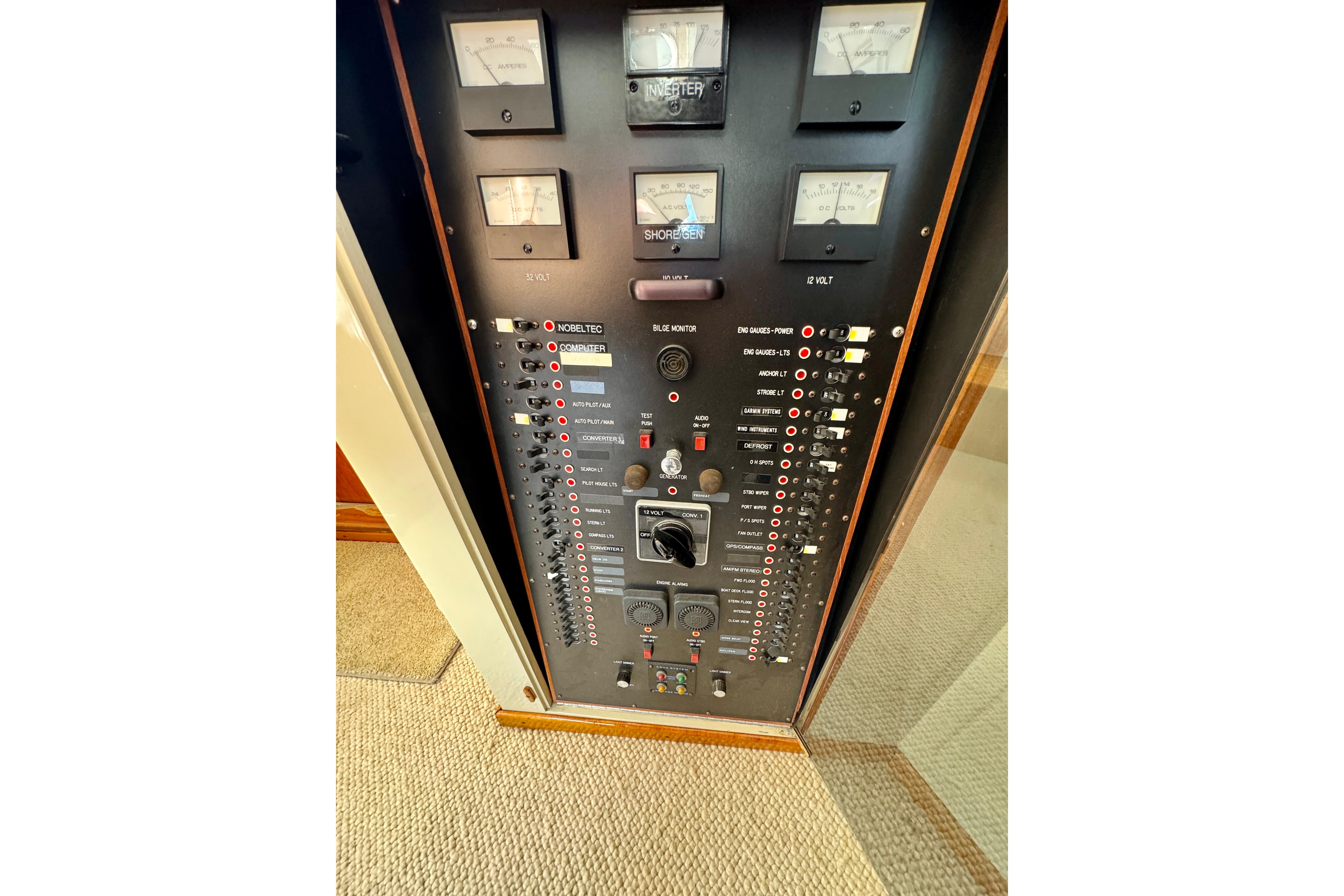 1958 Blanchard Pilothouse control panel with gauges and switches.