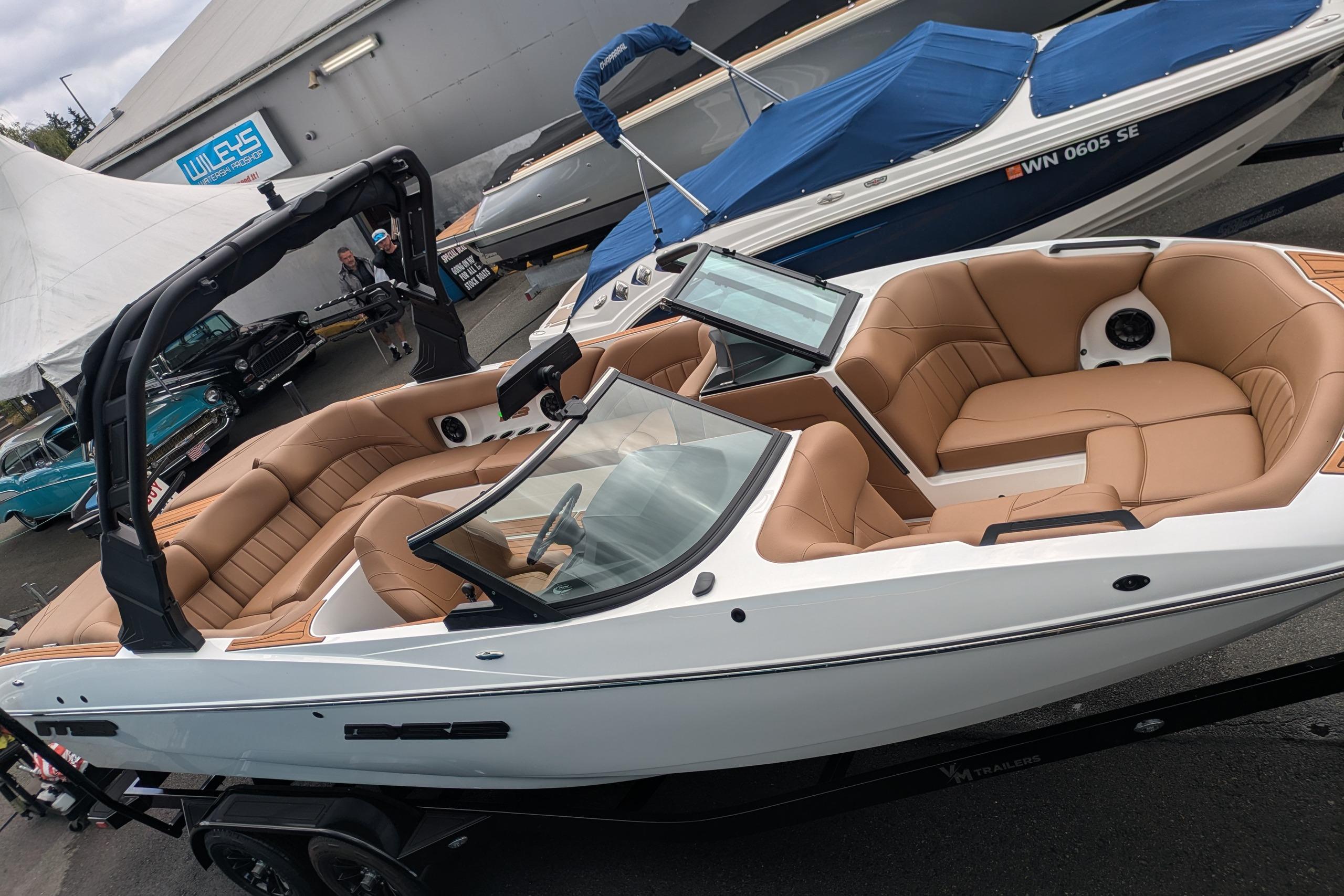 2026 MB B52-23 Classic LIMITED boat with luxurious tan interior on display.
