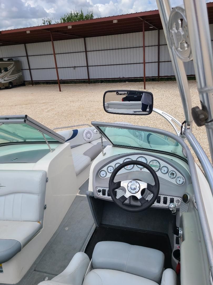 2003 MasterCraft X-9 boat interior with steering wheel and dashboard controls.