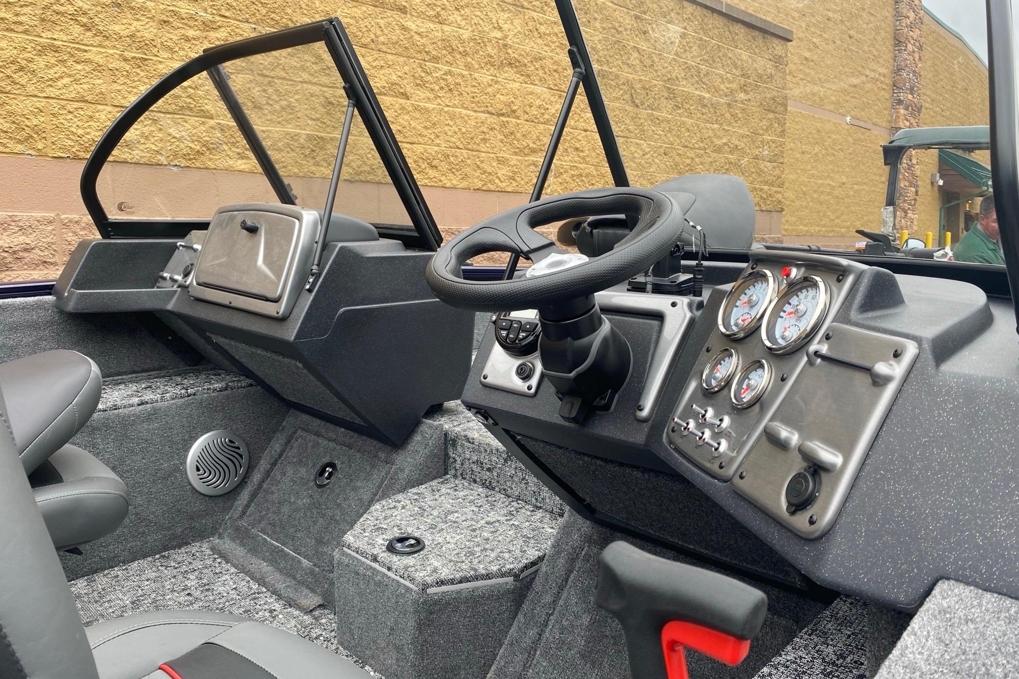 Interior view of 2026 Tracker Pro Guide V-175 WT boat dashboard and controls.