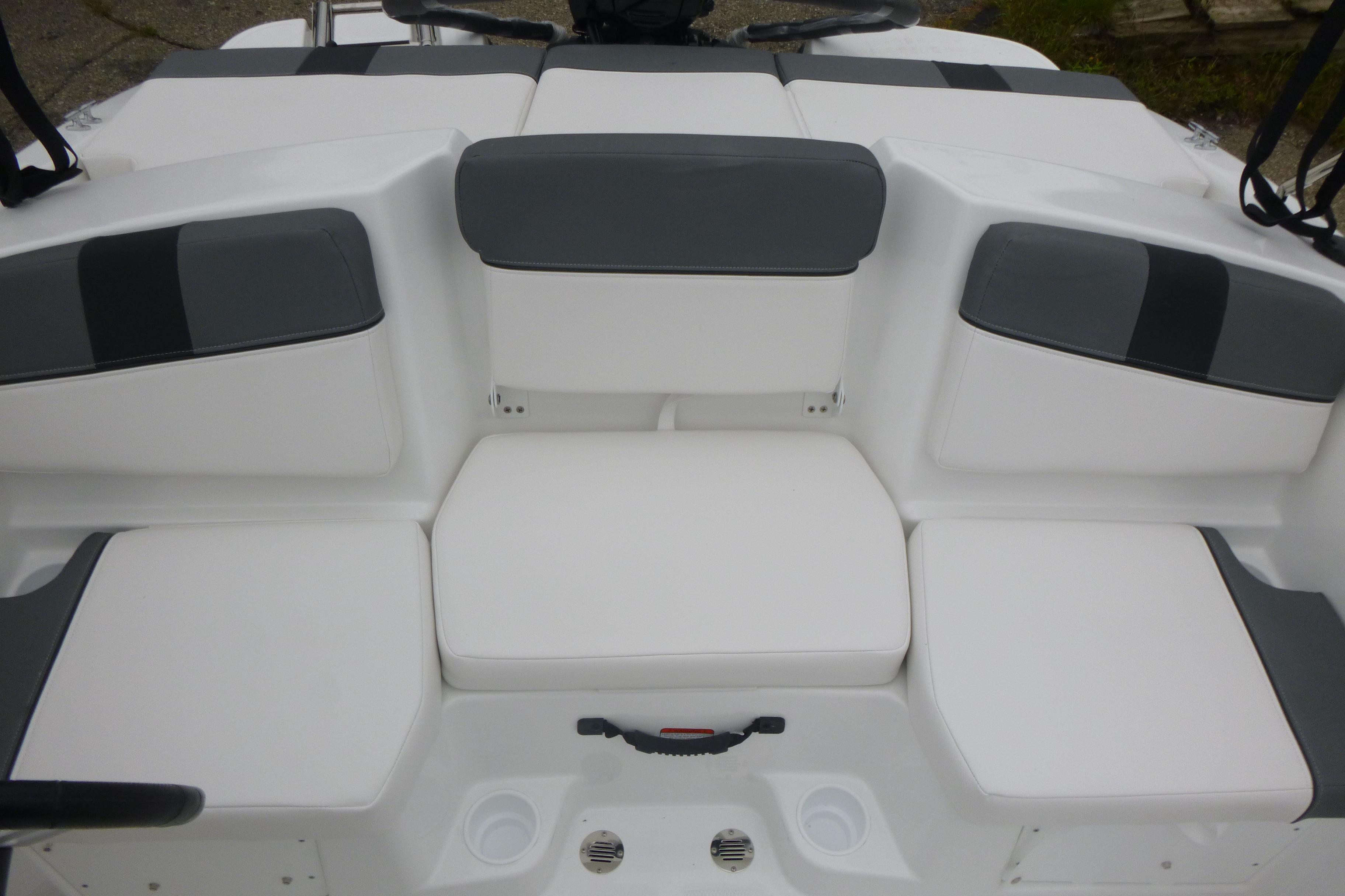 2026 Tahoe T16 boat interior with white and gray cushioned seating.