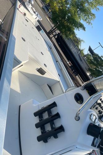 2024 Ranger RB200 boat with sleek white deck and modern controls.