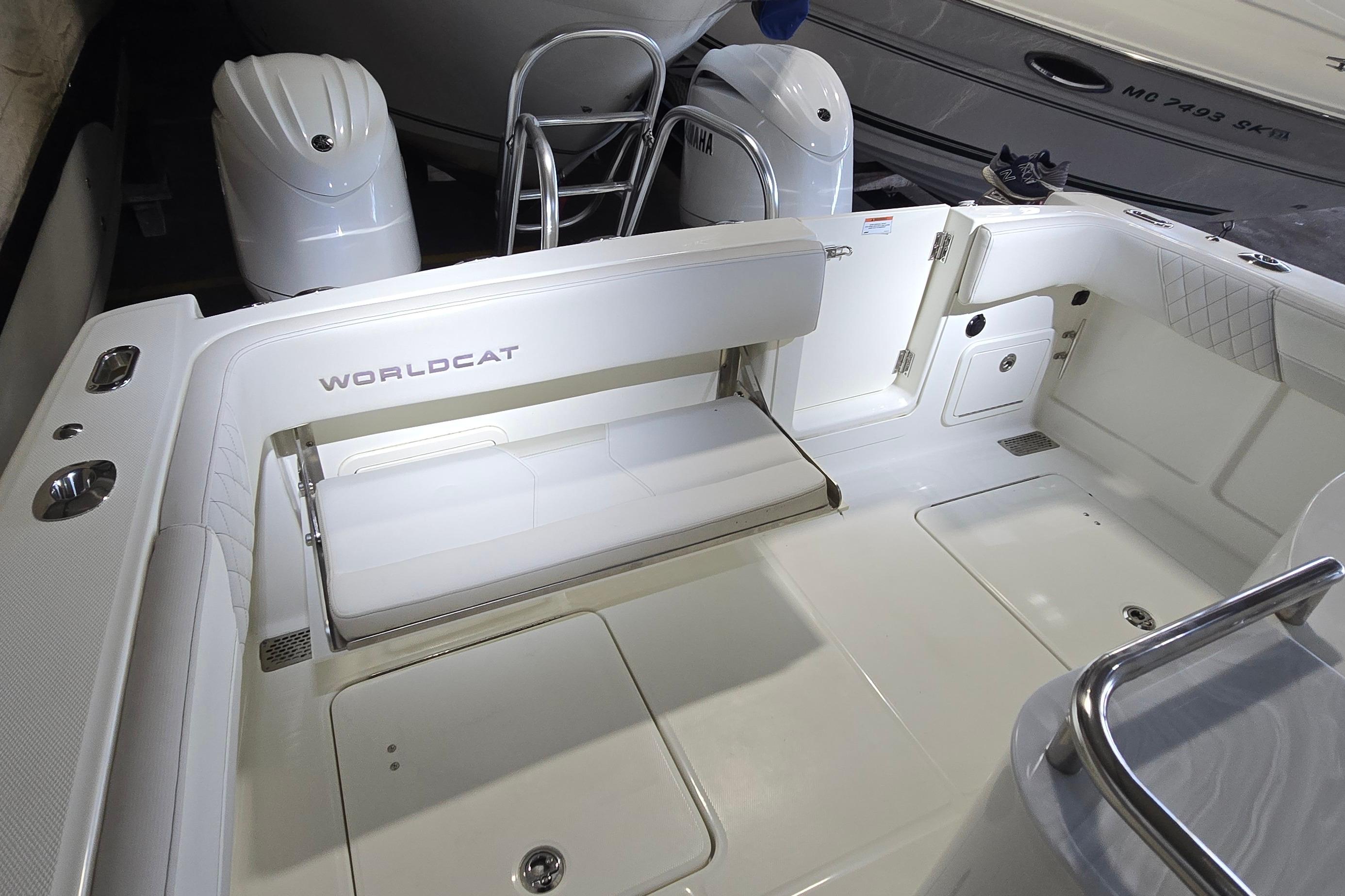 2024 WorldCat 280 CC-X boat interior with seating and dual engines.