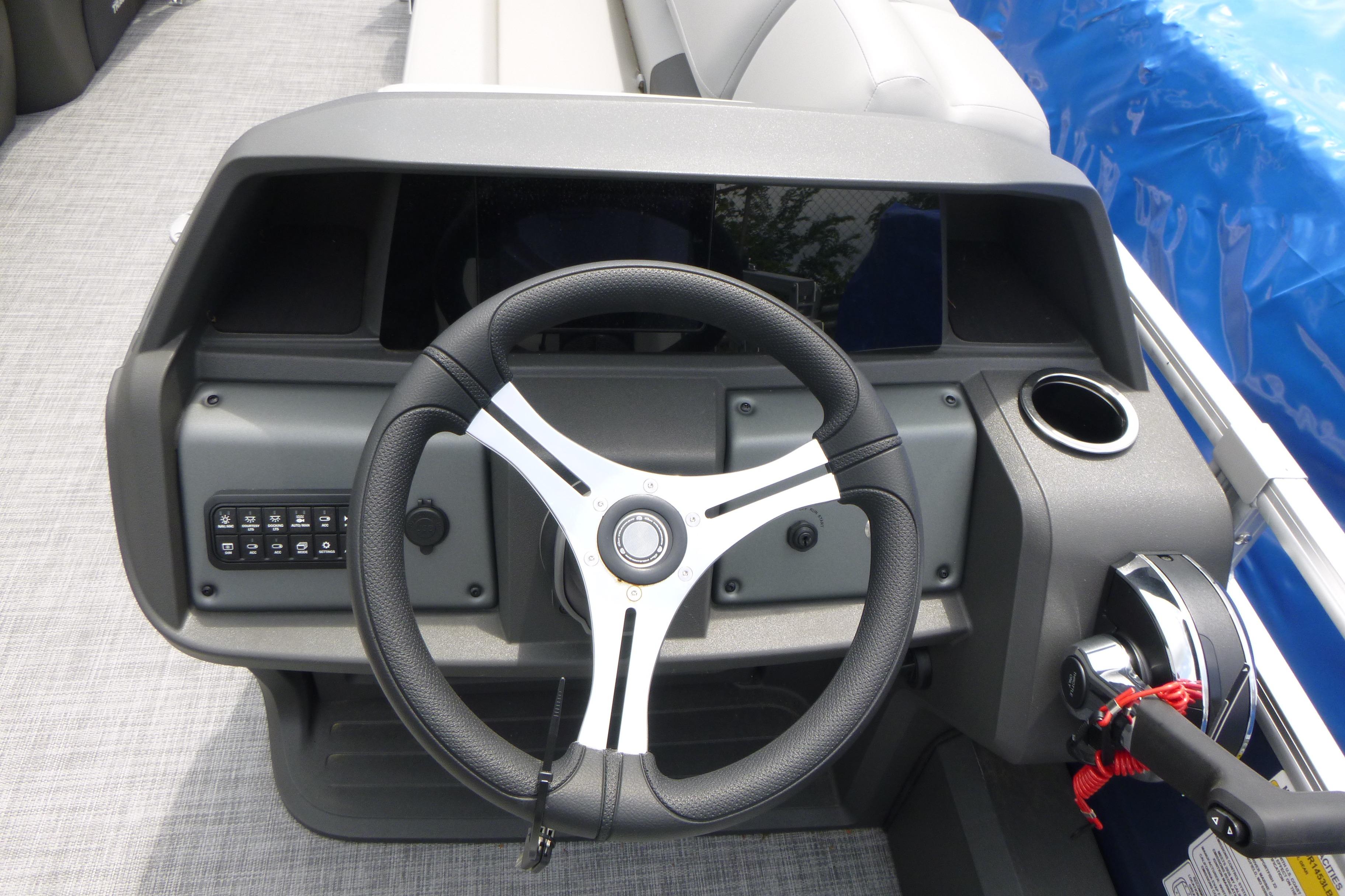 Steering console of 2026 Sun Tracker SportFish 22 DLX pontoon boat.