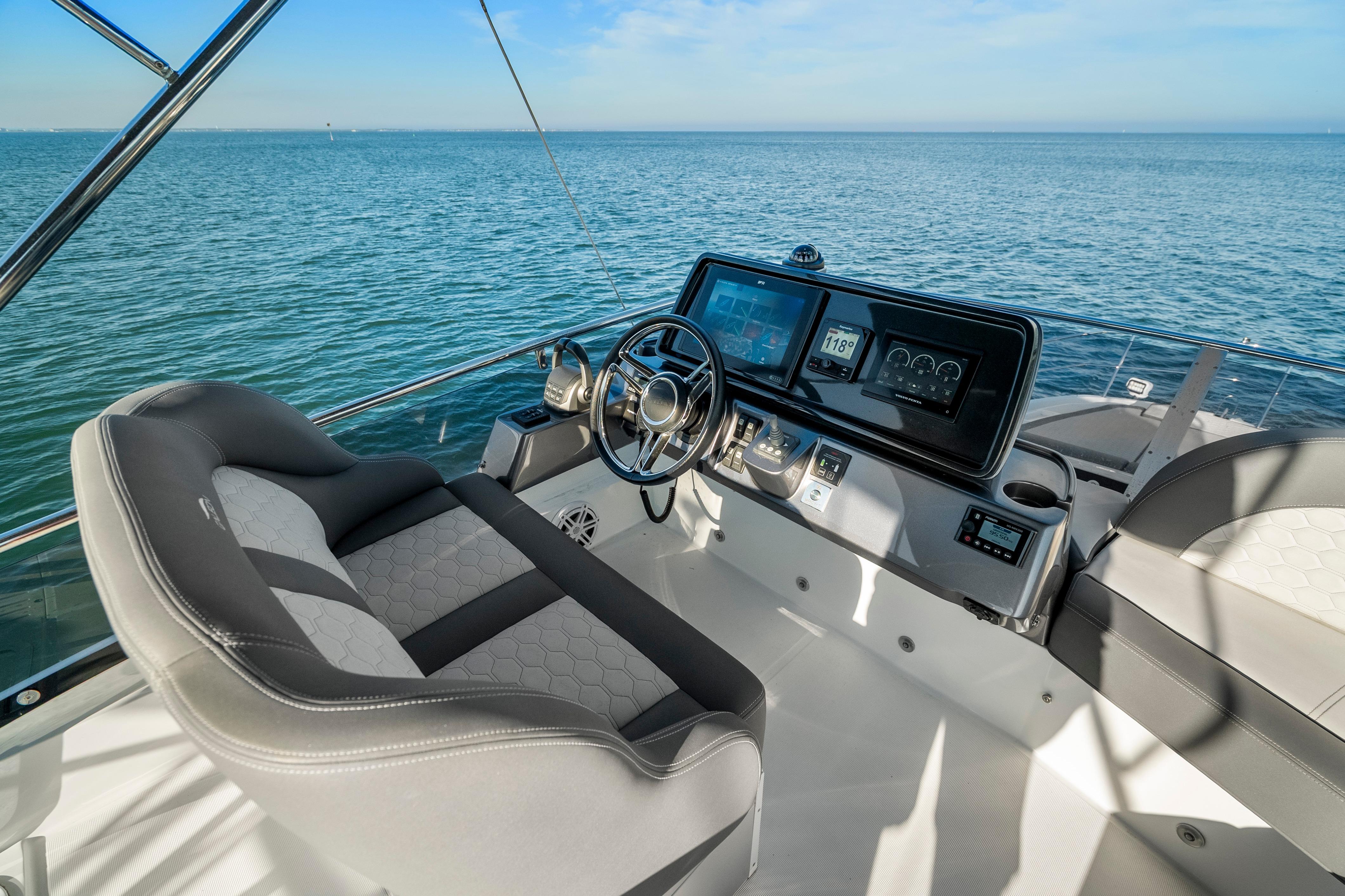 2023 Galeon 400 Fly yacht helm with modern controls and ocean view.