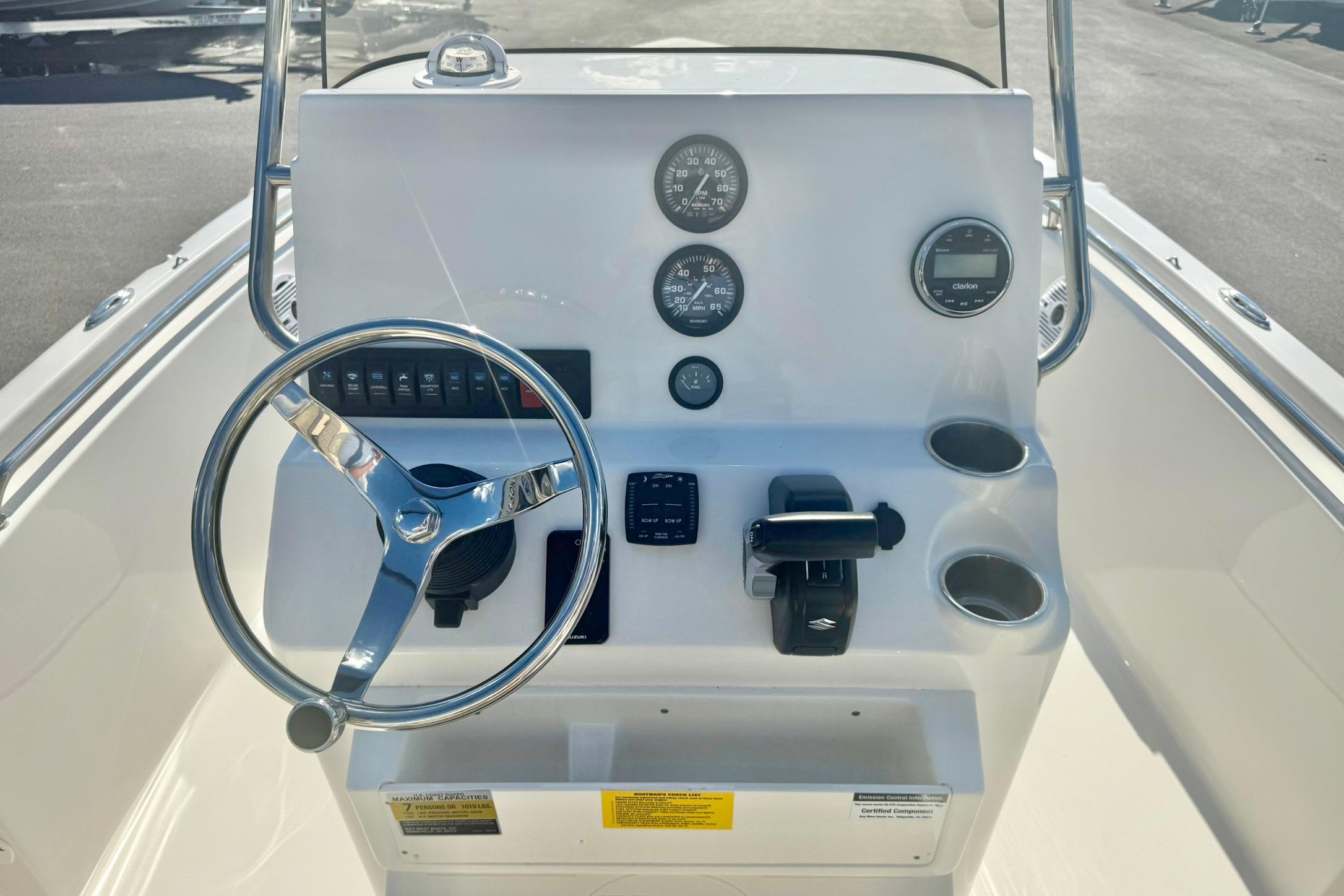 2026 Key West 189 FS boat console with steering wheel, gauges, and controls.